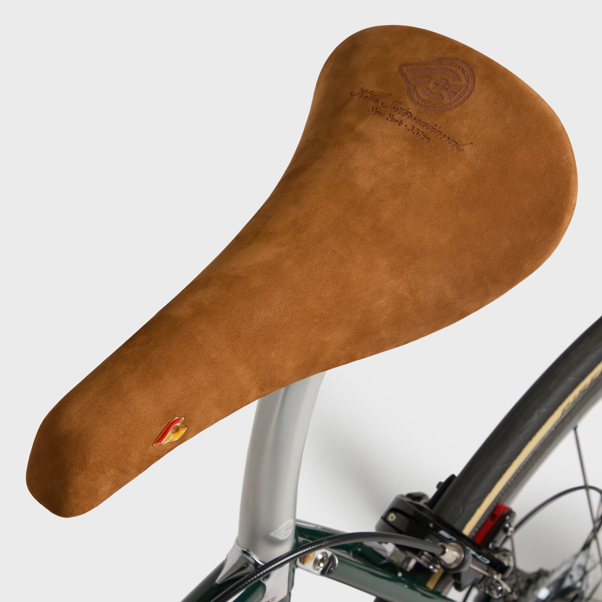 Kith for Cinelli Supercorsa Stadium bike, brown suede Cinelli saddle embossed Kith International New York Milan on a silver post