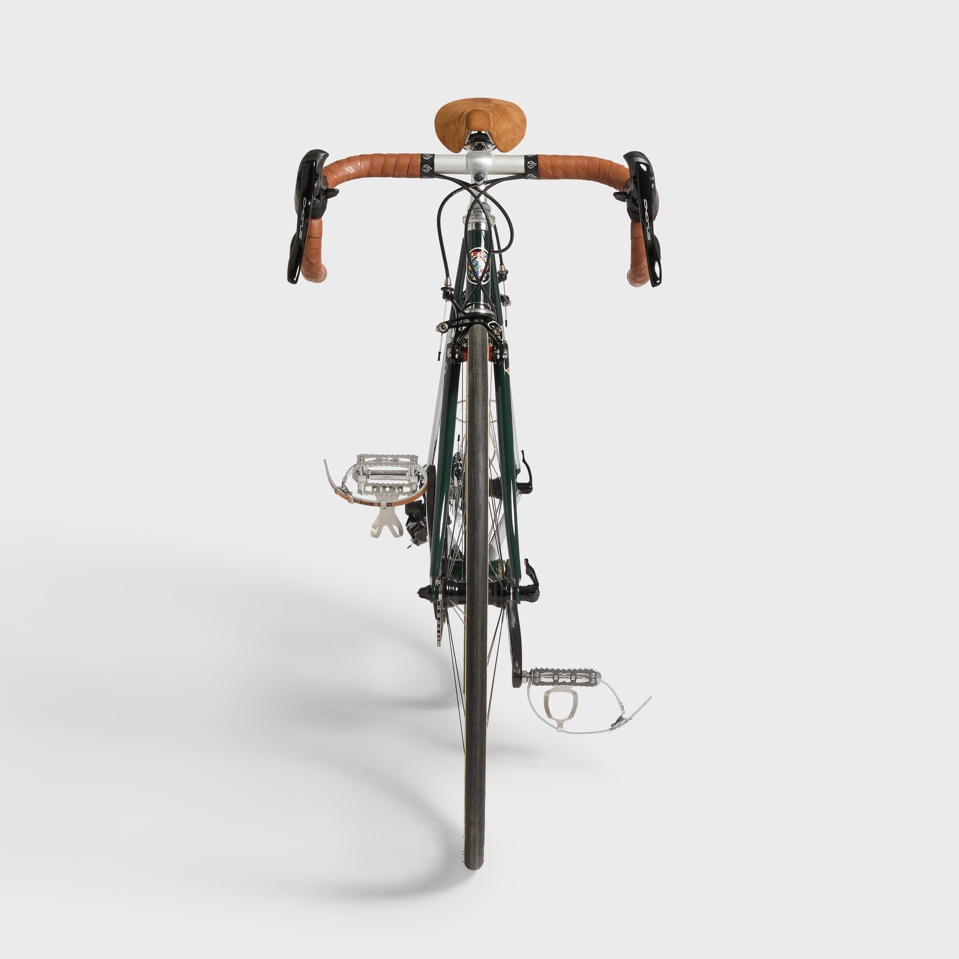 Kith for Cinelli Supercorsa Stadium bike, head-on front view showing the fork, tan bar tape, brake levers and MKS pedals