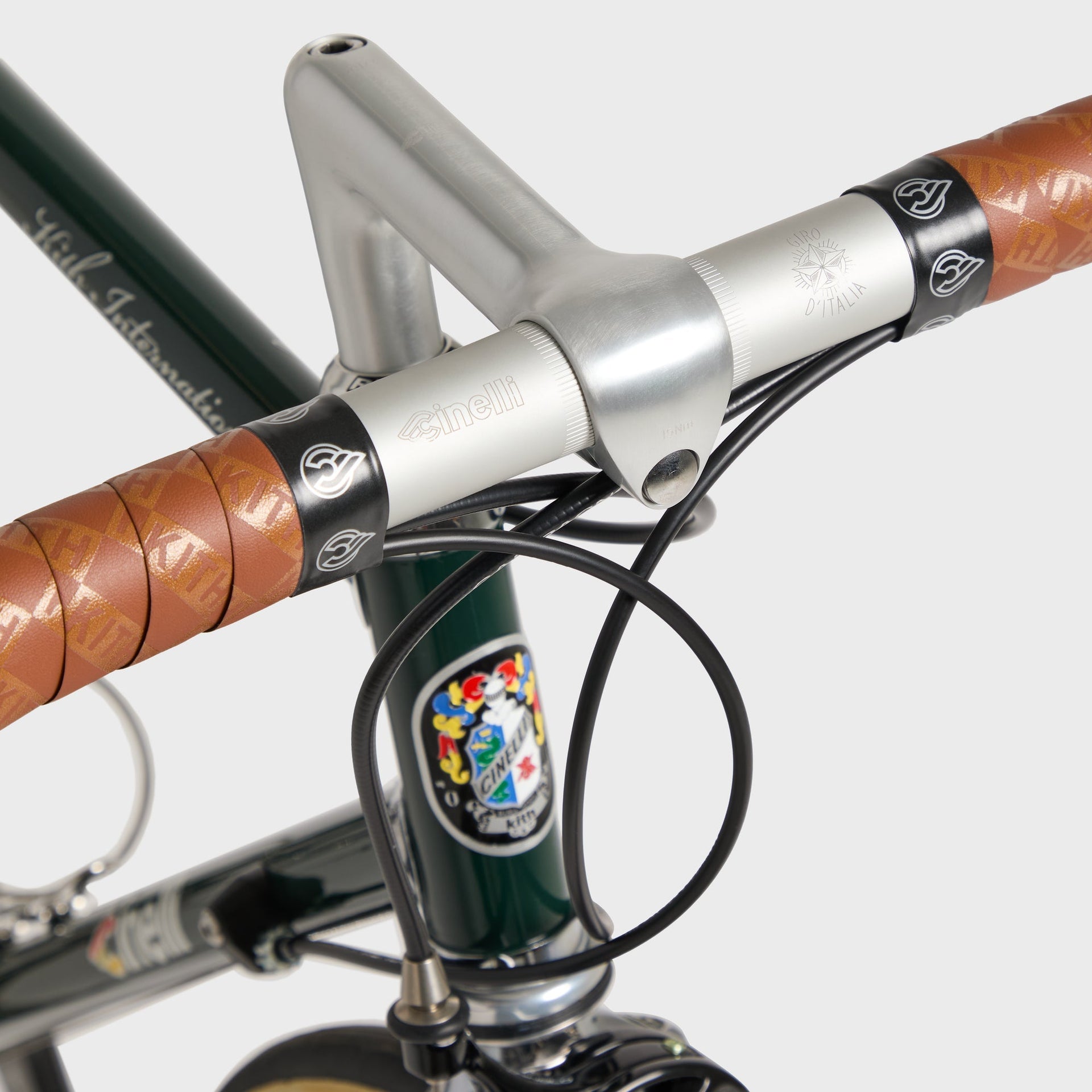 Kith for Cinelli Supercorsa Stadium bike, top-down view of the polished Cinelli stem with Giro d'Italia badge and Kith bar tape