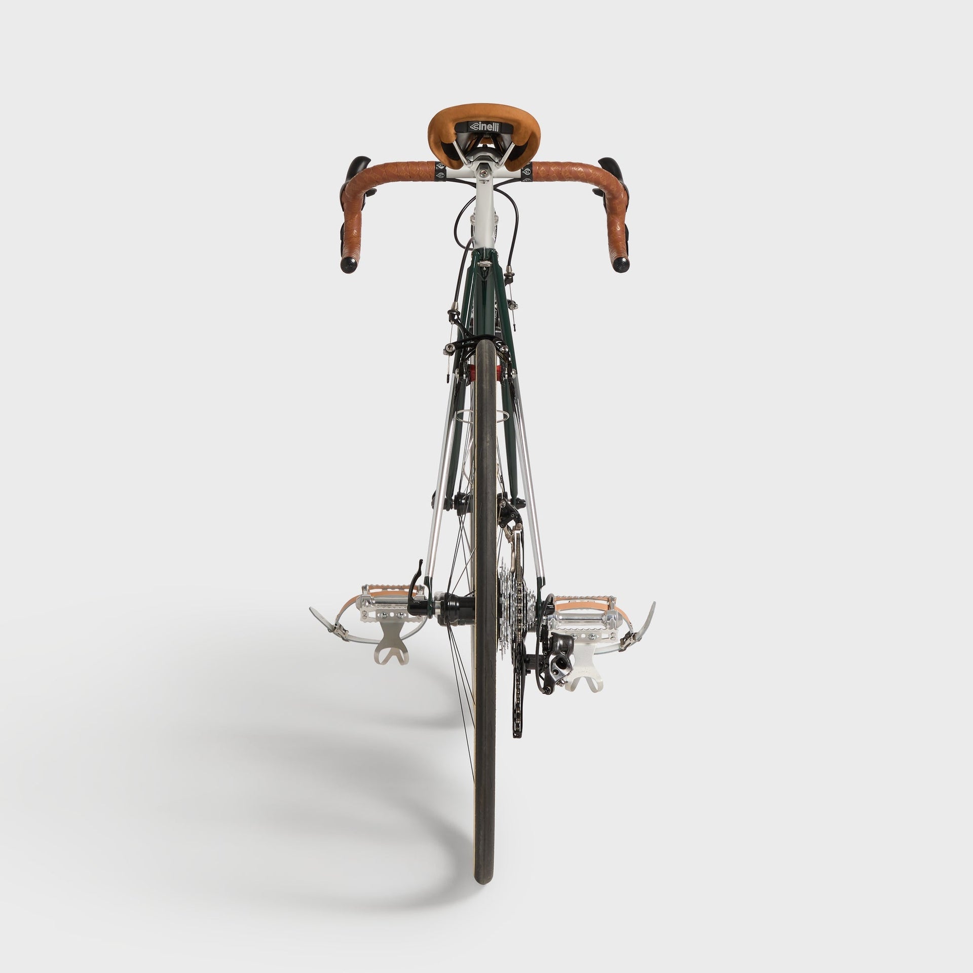 Kith for Cinelli Supercorsa Stadium bike, rear elevation from behind showing saddle, rear wheel, cassette and MKS pedals
