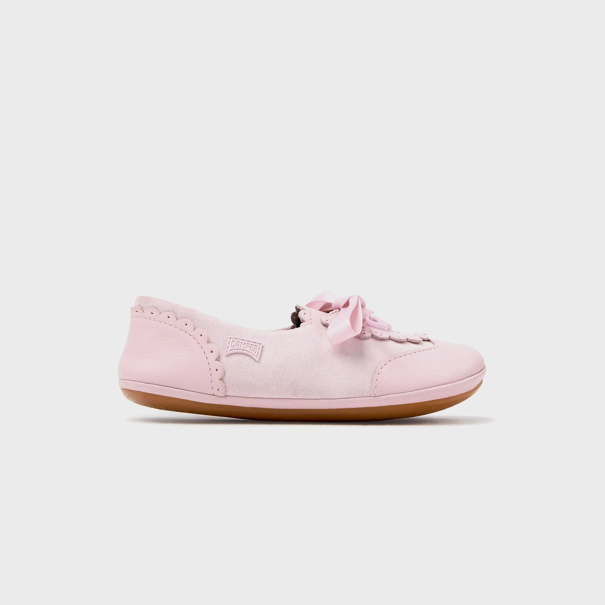 Camper Kids pink suede Mary Jane flat with scalloped trim, grosgrain ribbon bow tie and embossed Camper logo, side view