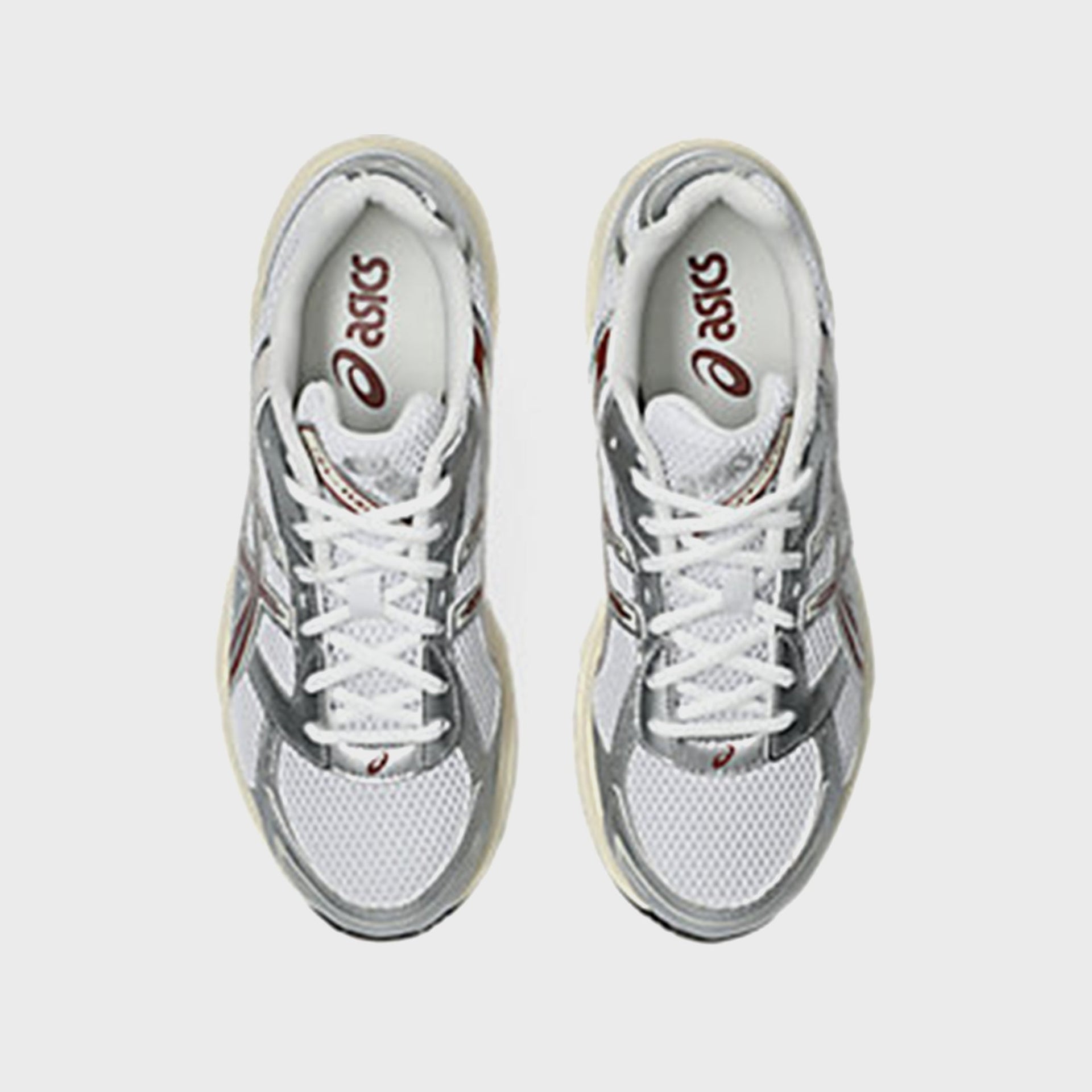 ASICS GEL-1130 in White and Rusted Rock, top-down view showing white laces and ASICS branded insoles