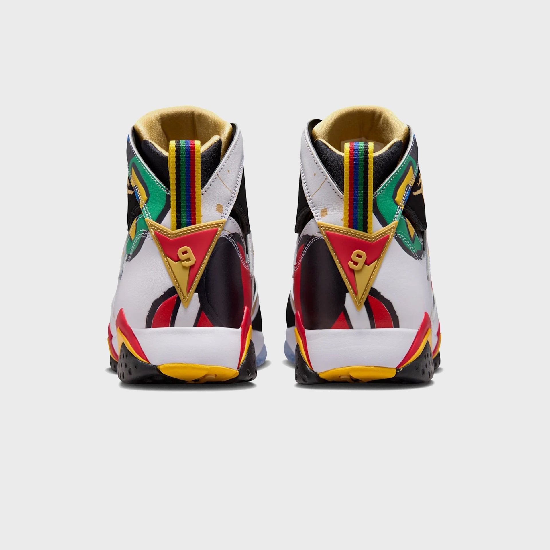 Rear heel view of a pair of Air Jordan 7 Retro sneakers showing the gold number 9 heel tabs and rainbow pull loops