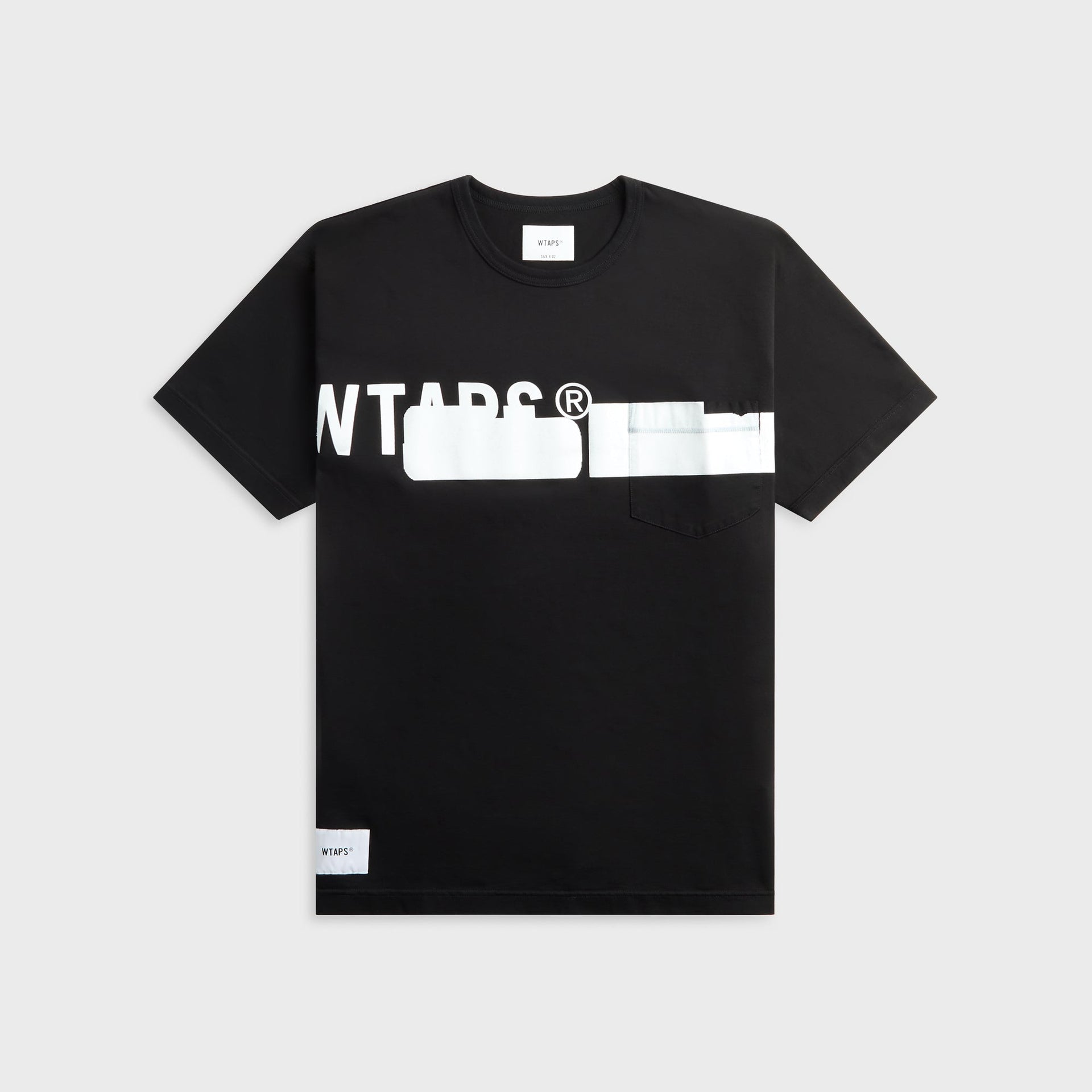 WTAPS Lim black cotton tee with distressed white logo graphic and chest pocket, front view, flat lay