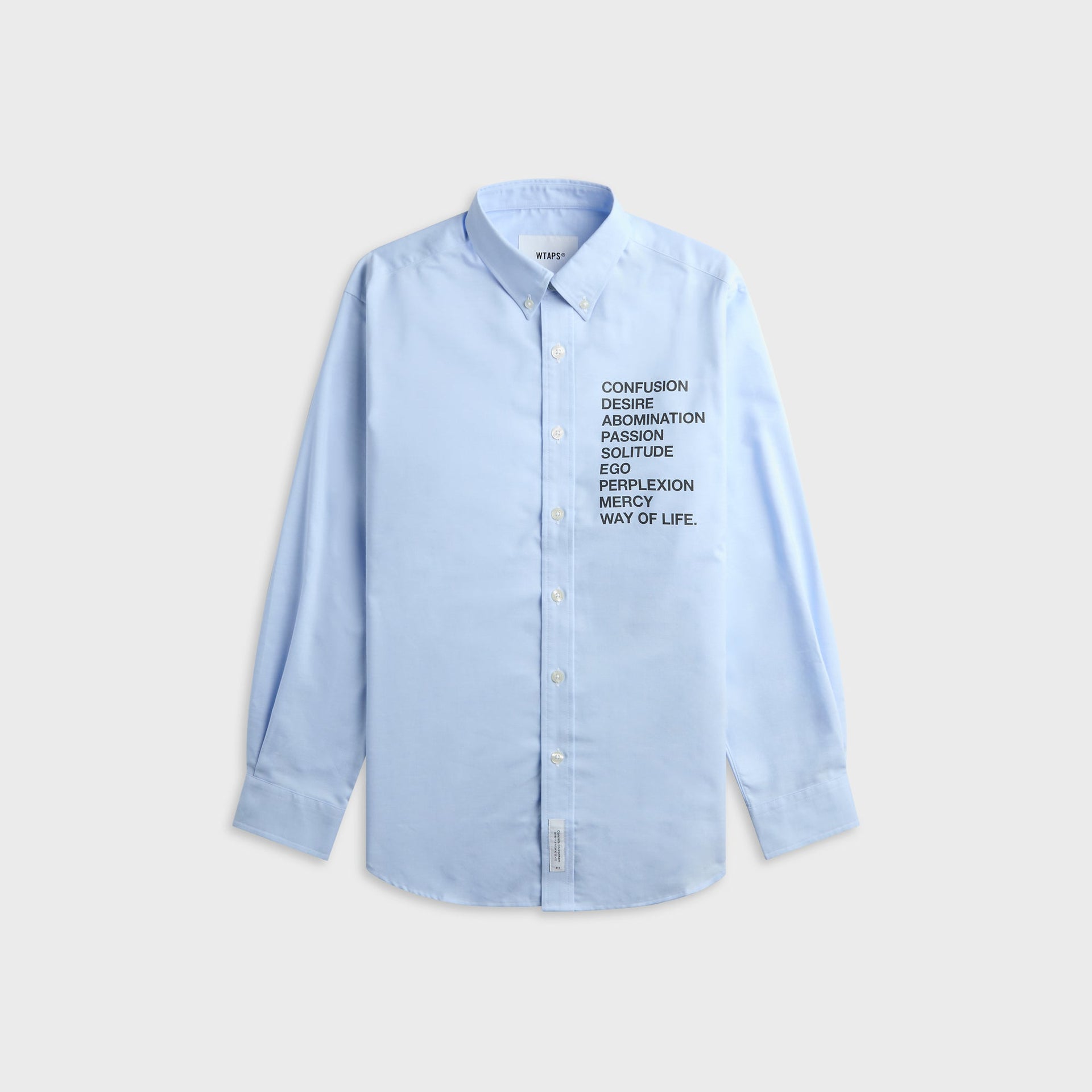 WTAPS BD 01 light blue oxford long sleeve shirt with printed word list graphic on chest, front view, flat lay