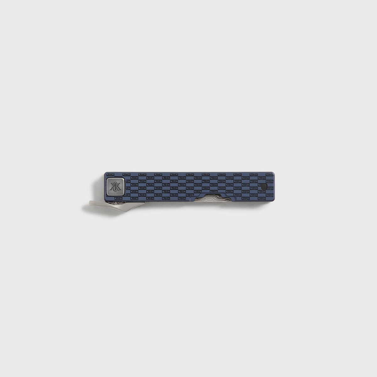 Kith x Benchmade Yamori folding knife closed, navy handle with KITH checkerboard engraving and X&K pivot logo, Nocturnal colorway