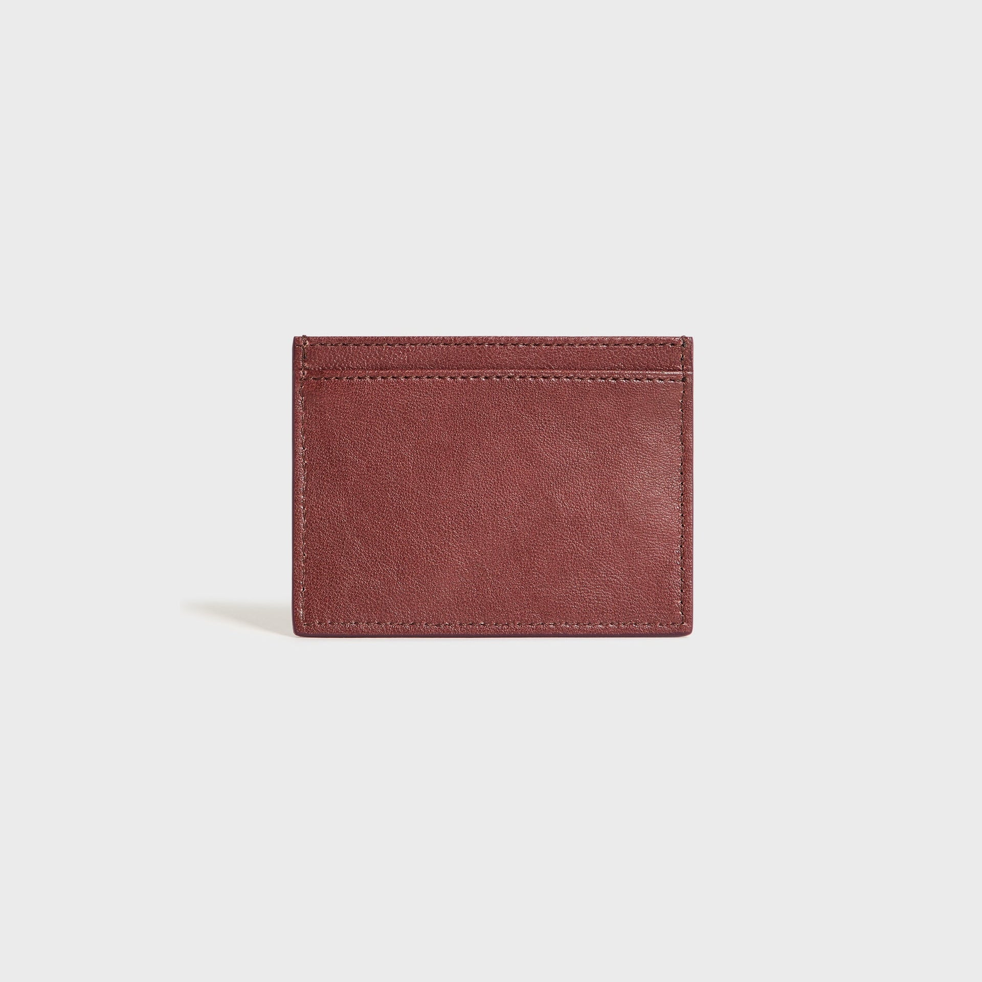 Vivienne Westwood chestnut leather card holder, back view showing plain grained leather and card slots