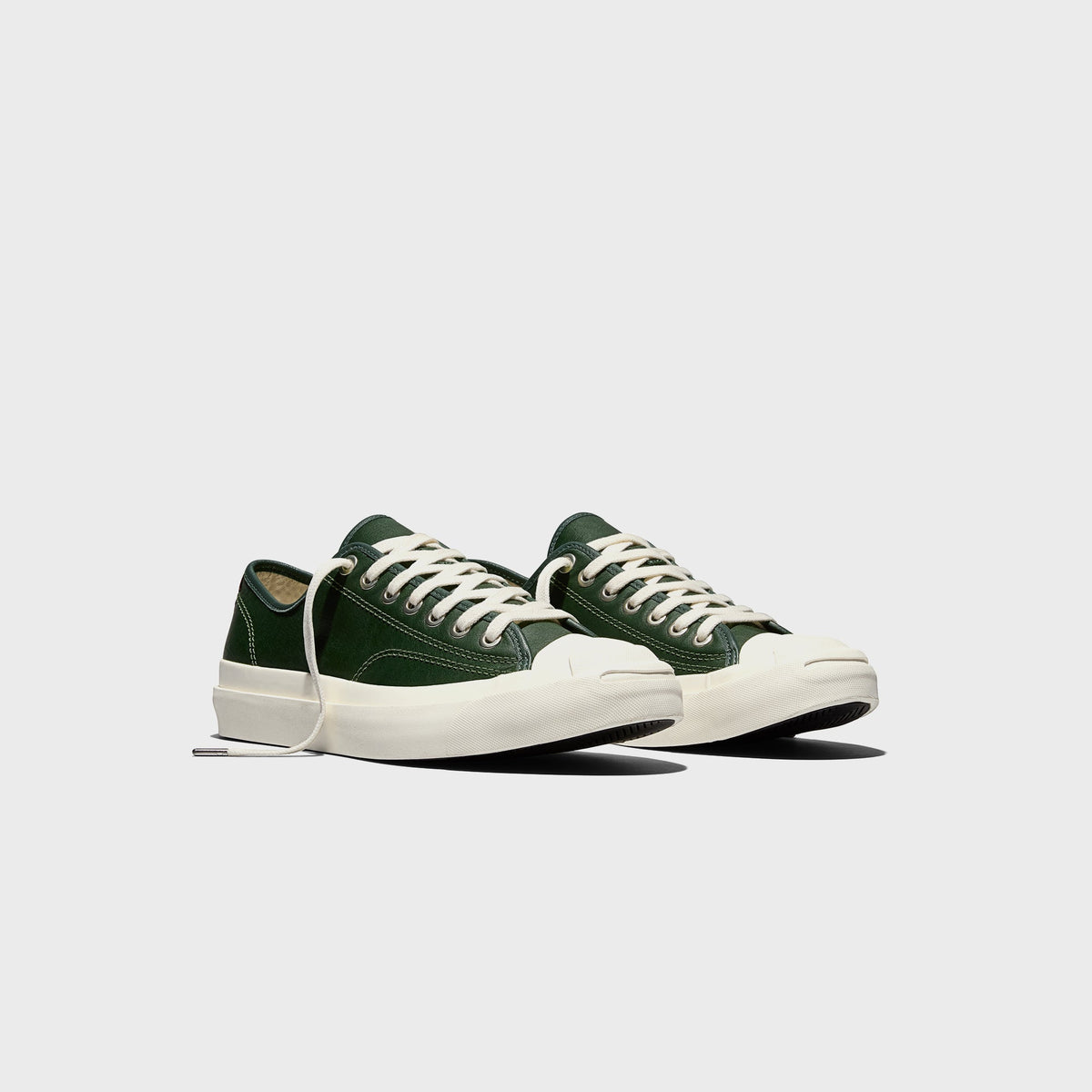 Converse Jack Purcell Premium green leather sneaker, front three-quarter view of pair