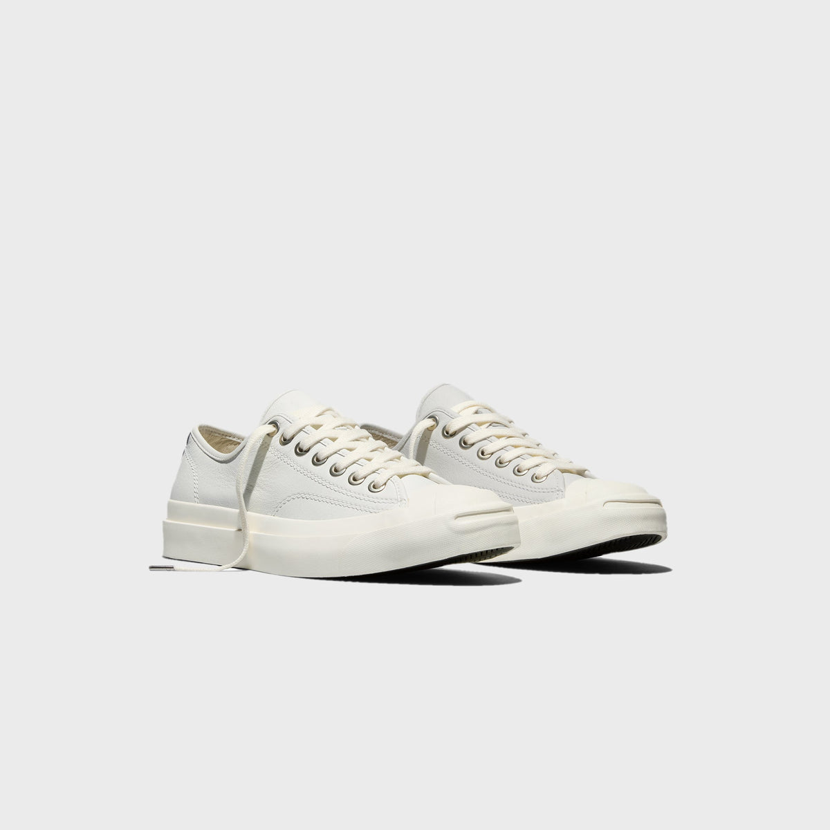 Converse Jack Purcell Premium white leather sneaker, front three-quarter view of pair