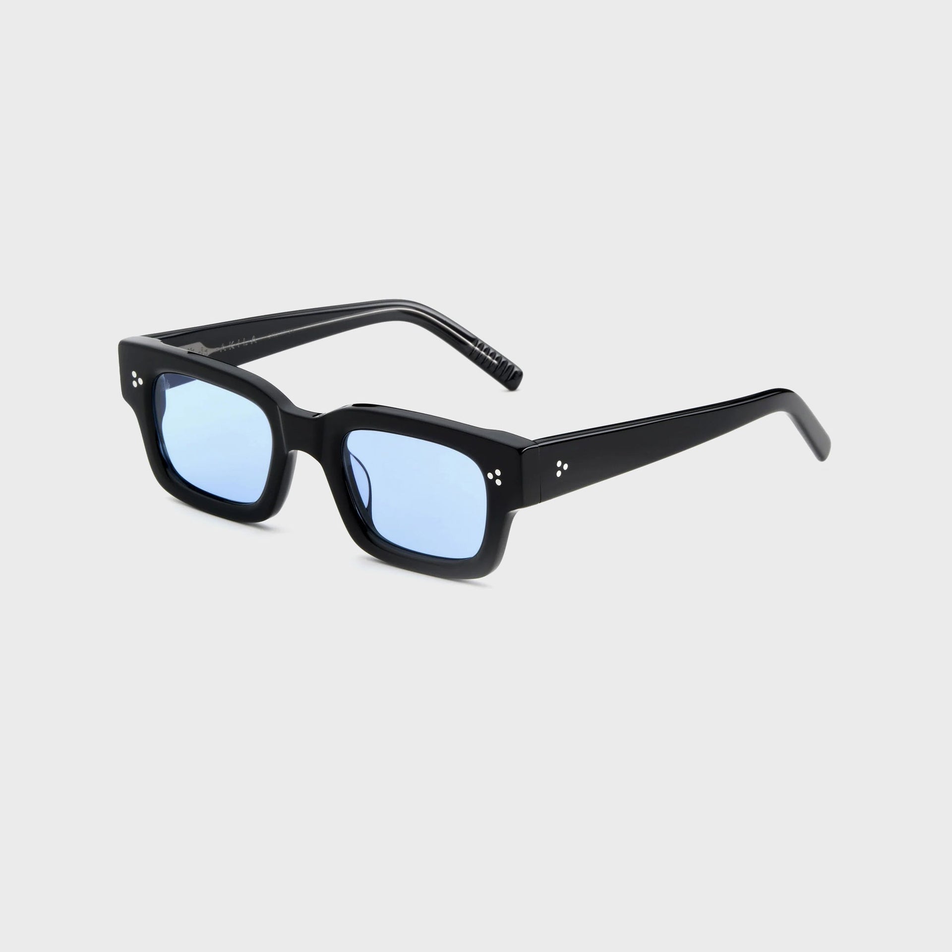 AKILA Syndicate sunglasses, 3/4 angle view, black rectangular frame, light blue lenses and bold temples
