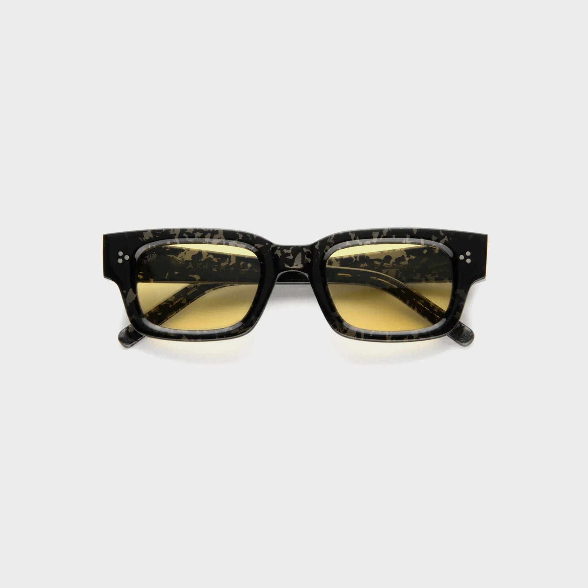 AKILA Syndicate sunglasses, front view, black tortoise acetate frame, yellow tinted lenses, three-rivet hinge detail