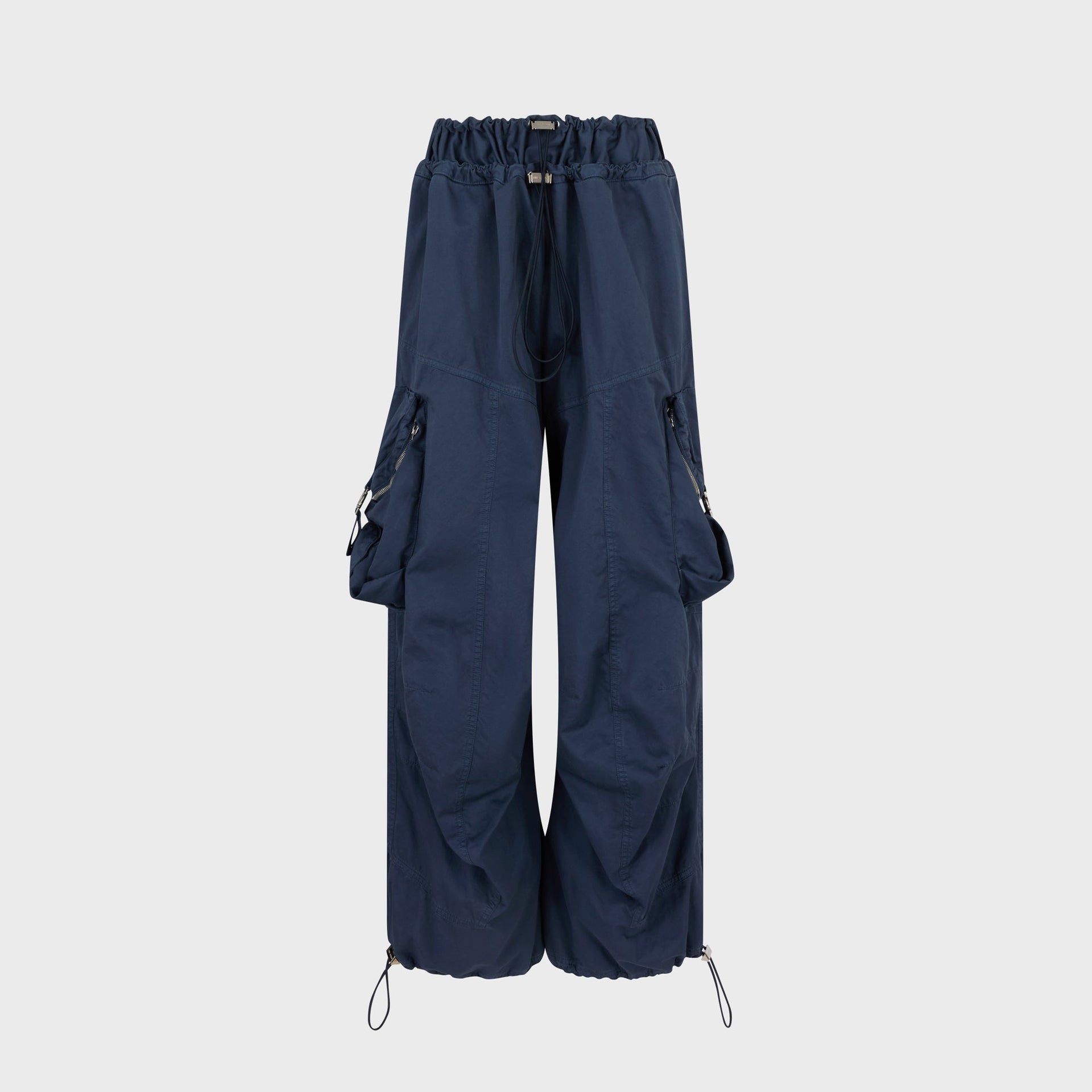 The Attico washed blue wide-leg cargo pant, parachute style with drawstring waist and toggle hems, front flat-lay