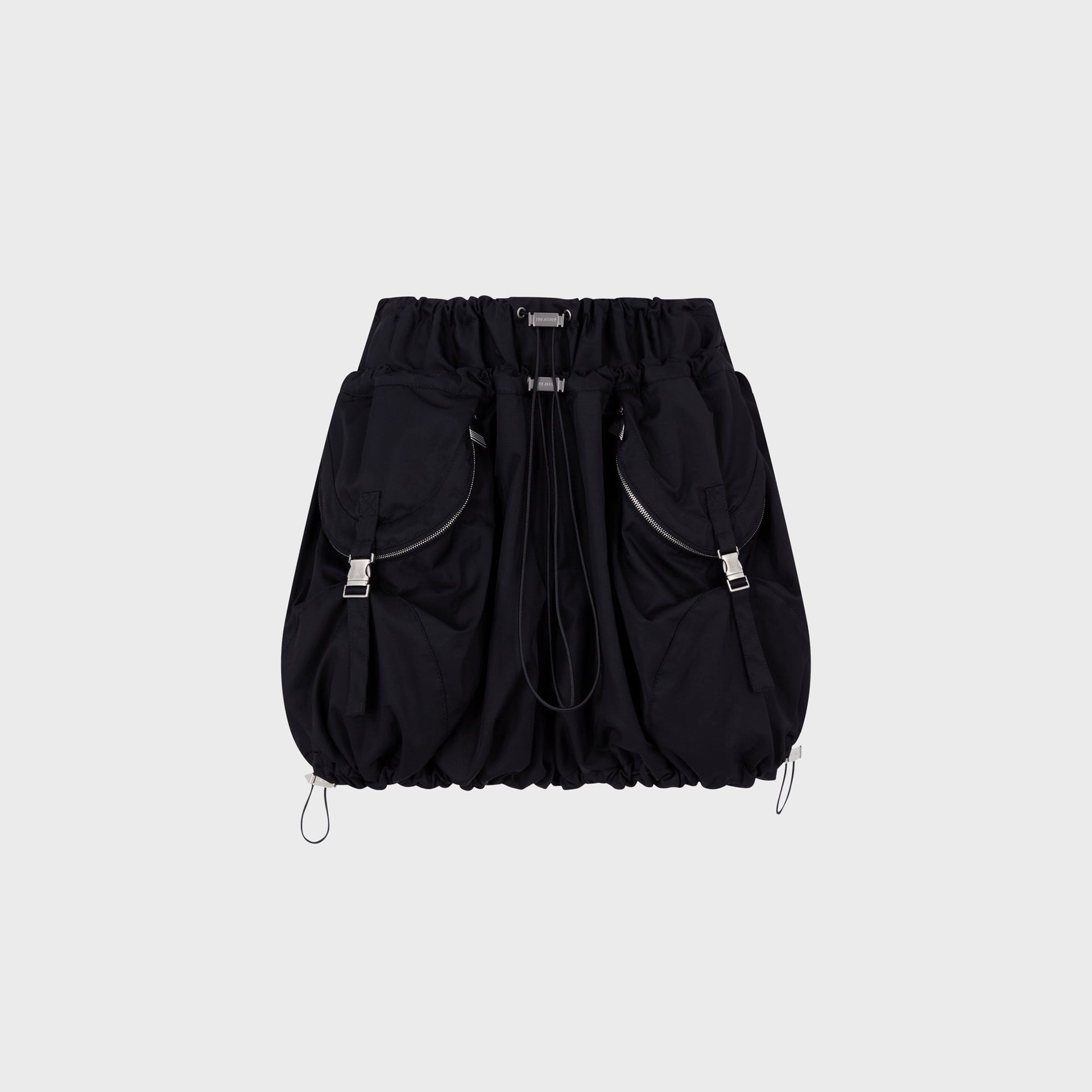 The Attico black cargo mini skirt with bubble hem, drawstring waist, and zip cargo pockets, flat lay