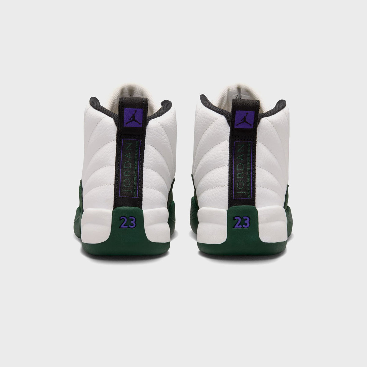 Heel view of Jordan PS Air Jordan 12 Retro preschool pair with Jordan wordmark pull tab and purple 23 numbering