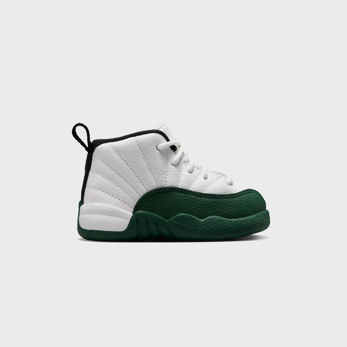 Jordan TD Air Jordan 12 Retro toddler sneaker in Summit White pebbled leather with Gorge Green toe, lateral side view