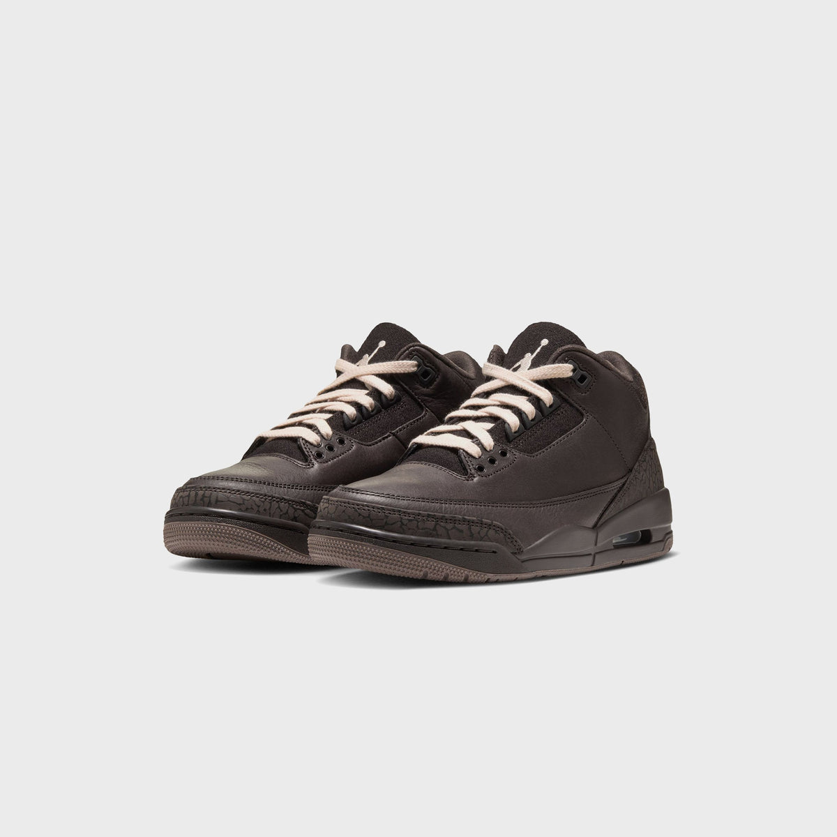 Jordan WMNS Air Jordan 3 Velvet Brown pair, front three-quarter view showing dark brown leather, cream laces and visible Air unit