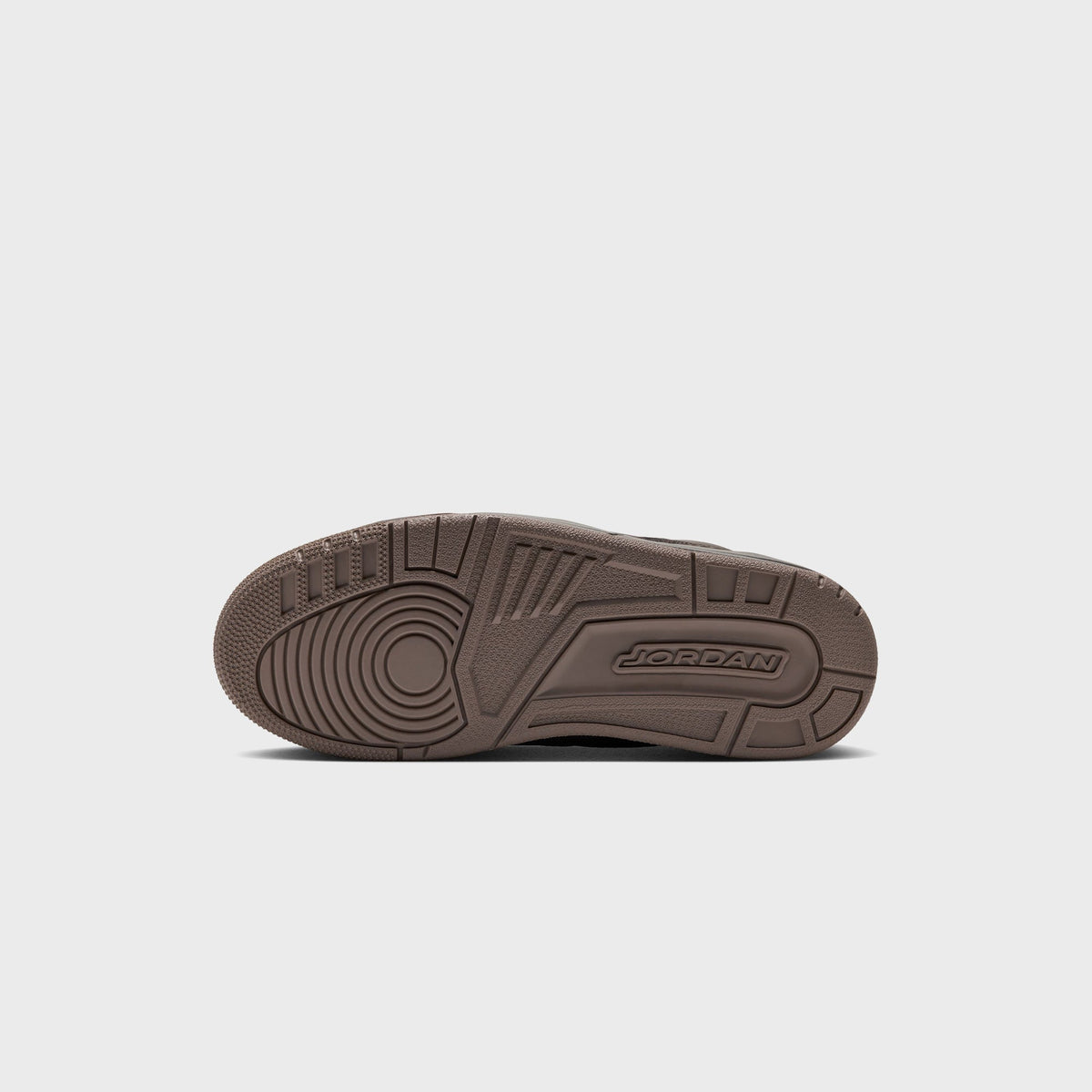 Jordan WMNS Air Jordan 3 Velvet Brown outsole view in taupe-brown rubber with circular pivot pattern and Jordan logo