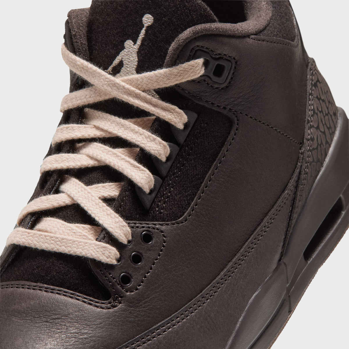 Jordan WMNS Air Jordan 3 Velvet Brown close-up of cream laces, suede-like tongue with Jumpman logo and brown leather eyestay
