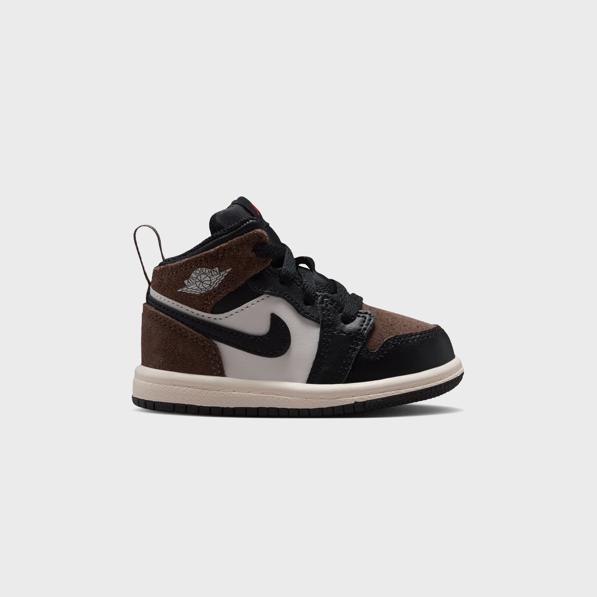 Jordan 1 Mid toddler shoe, lateral view with palomino brown suede, phantom leather, black Swoosh and sail midsole
