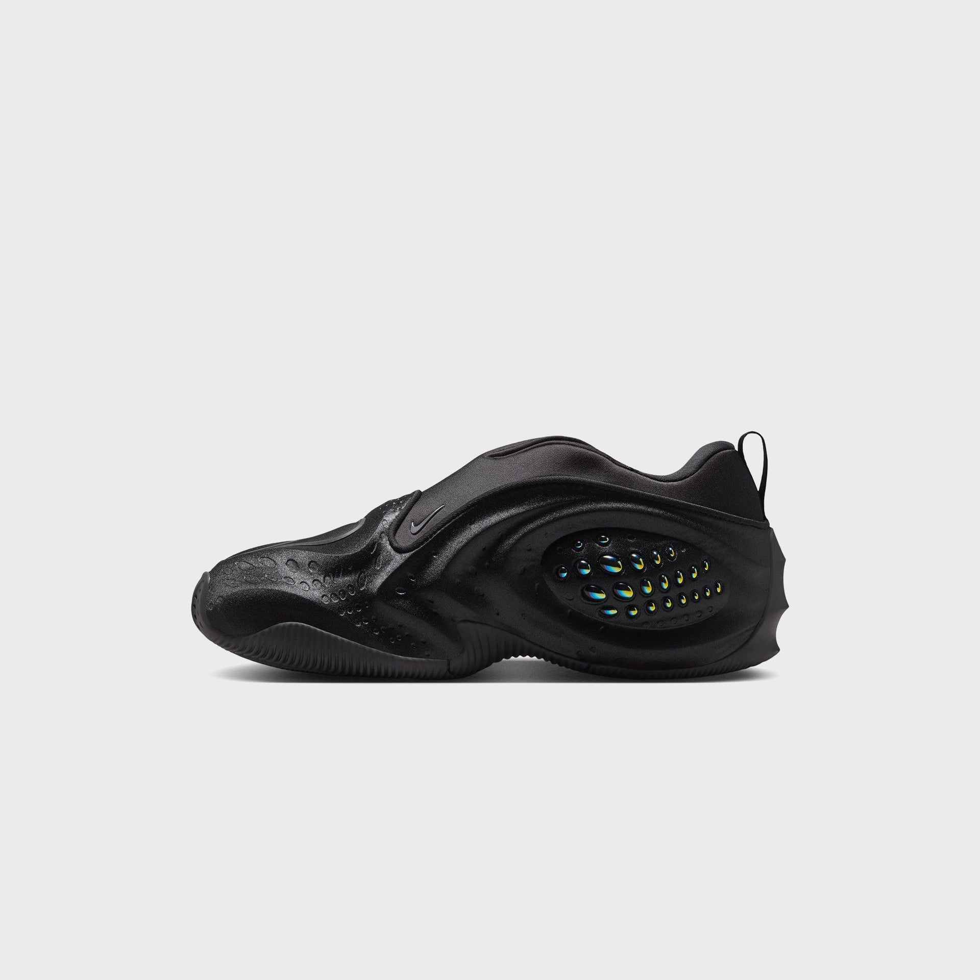 Nike WMNS First Sight Shadow Triple Black, medial side profile with iridescent bubble pod, black neoprene collar and heel pull tab