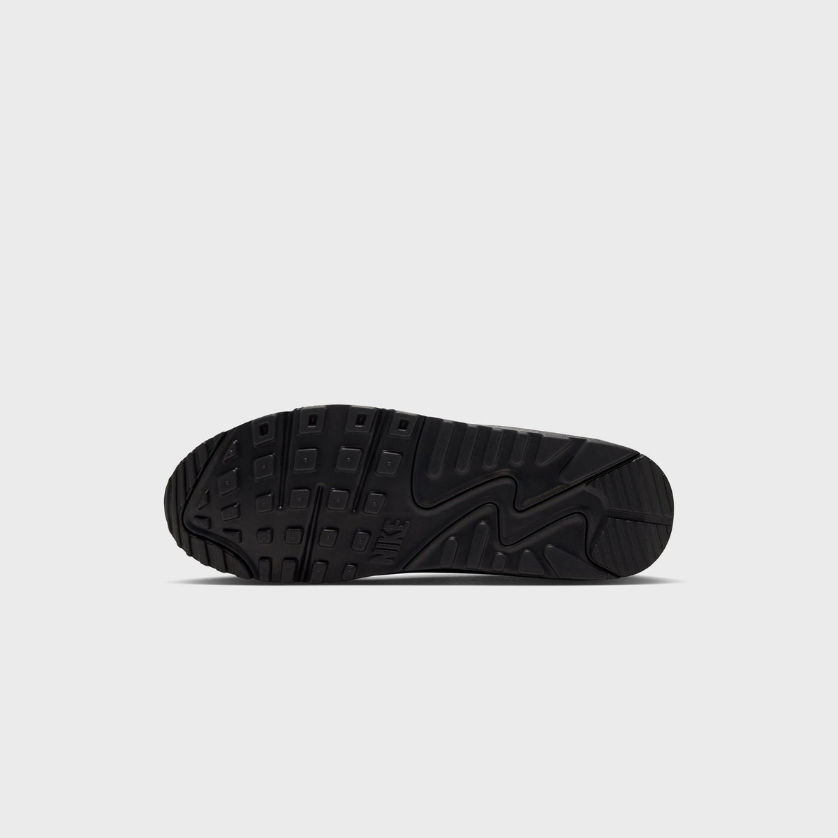 Outsole view of Nike x Wagyu Air Max 90 showing black waffle and herringbone rubber tread with Nike branding