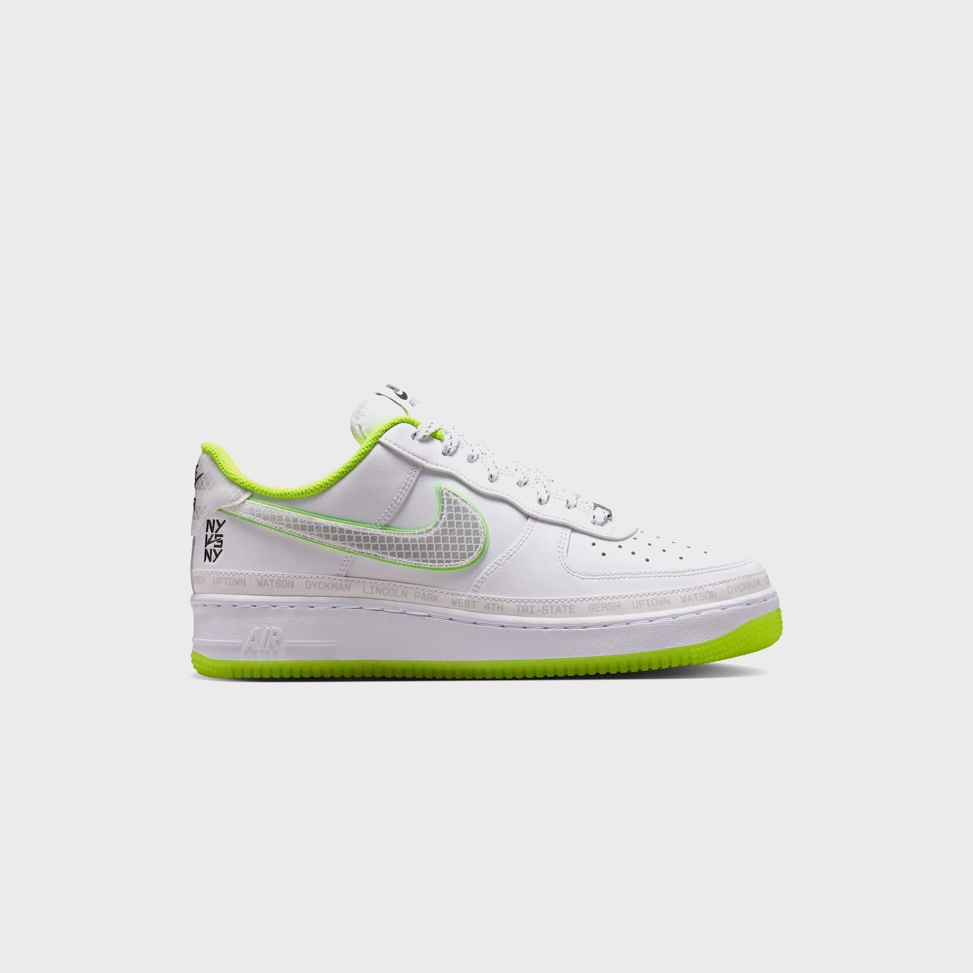 Nike Air Force 1 '07 in white leather, lateral view with a volt translucent sole, grid-mesh green-edged Swoosh and neighborhood-name midsole tape
