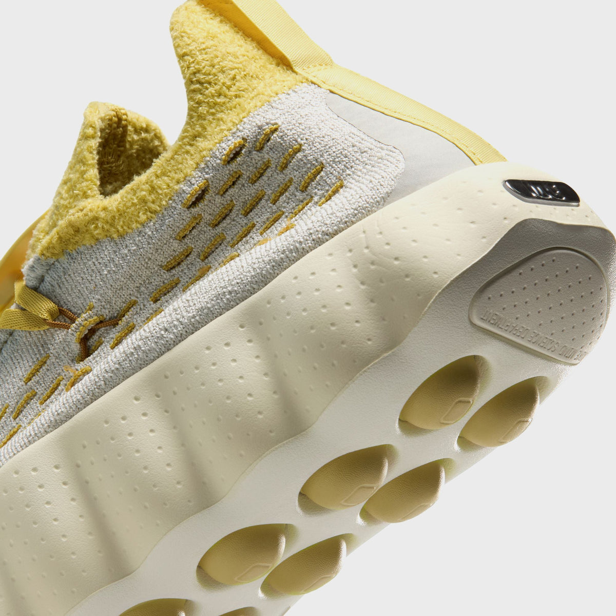 Nike Mind 002 - Light Bone / Saturn Gold / Infinite Gold / Wheat / Sail