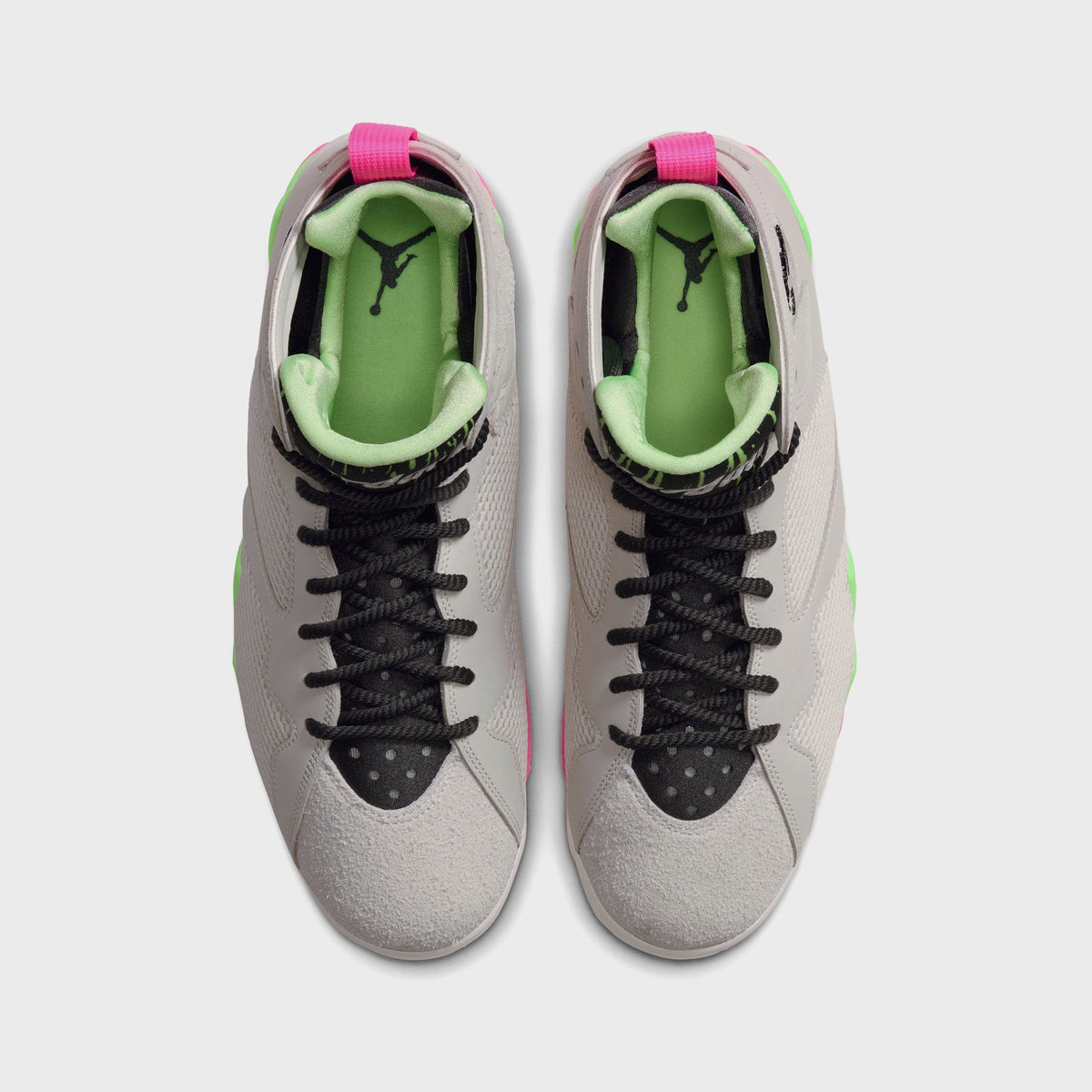 Top-down view of Air Jordan 7 Phantom Lime Blast sneakers showing green interior lining