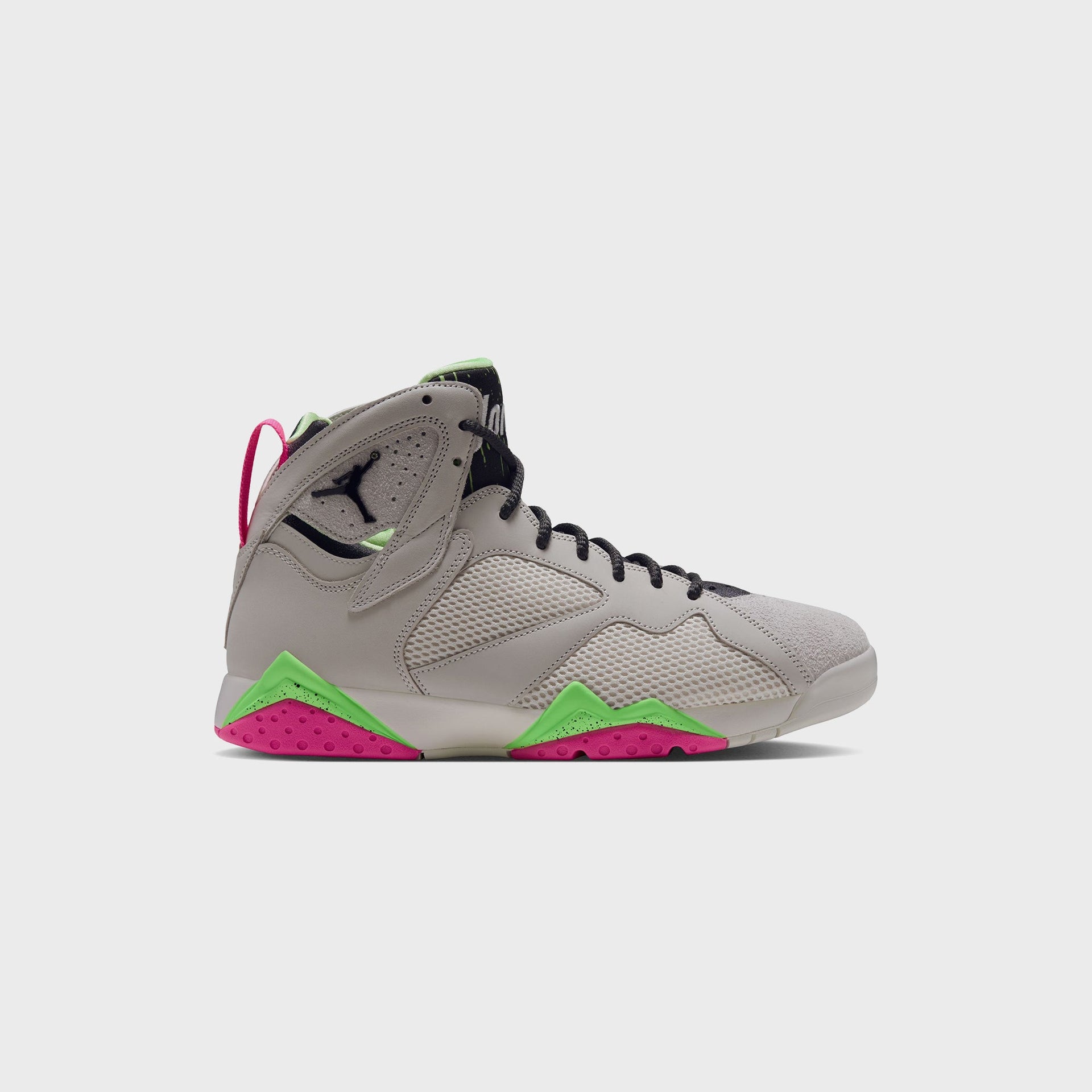Air Jordan 7 sneaker in Phantom grey with lime green and pink accents, side profile view