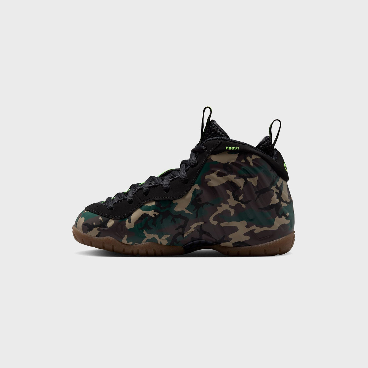 Pair of Nike PS Little Posite Pro preschool sneakers in camo and black, three-quarter angled view