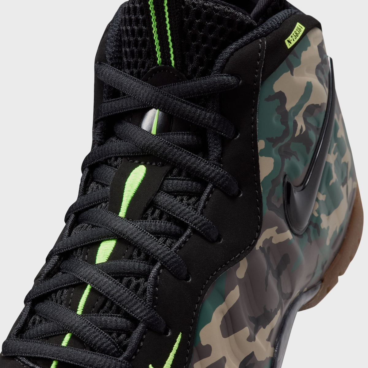 Close-up of Nike PS Little Posite Pro toe from a low angle showing textured camo foam ribbing