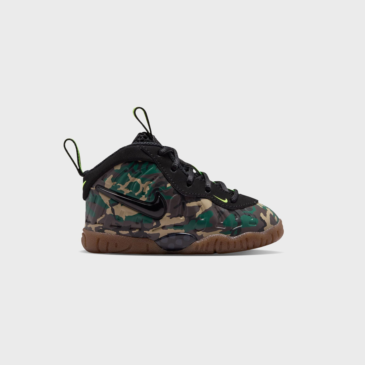 Nike TD Little Posite Pro toddler sneaker in green camo with black strap closure, volt accents and gum sole