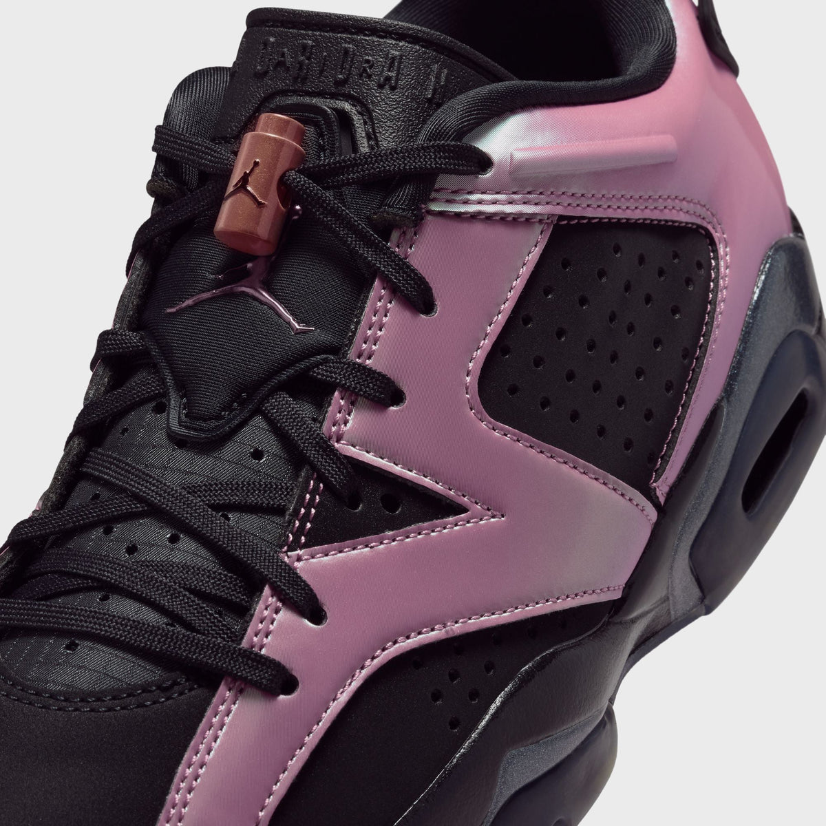 Jordan WMNS Air Jordan 6 Low in Black / Desert Berry, close-up of the pink and black toe box with lace lock