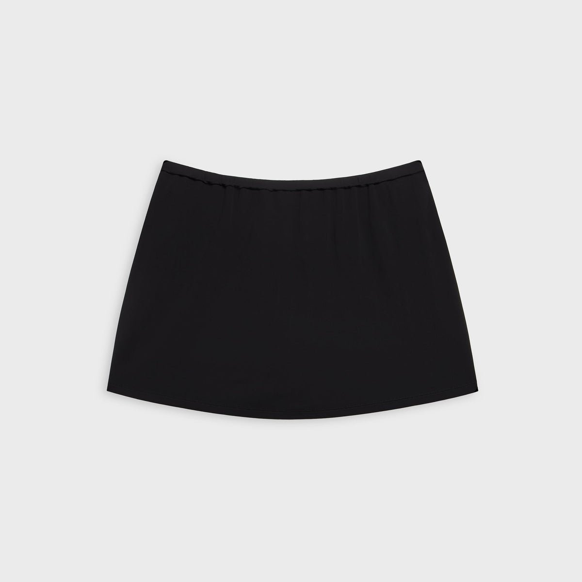 Alexander Wang black mid rise mini skort, flat lay alternate view showing waistband and hem
