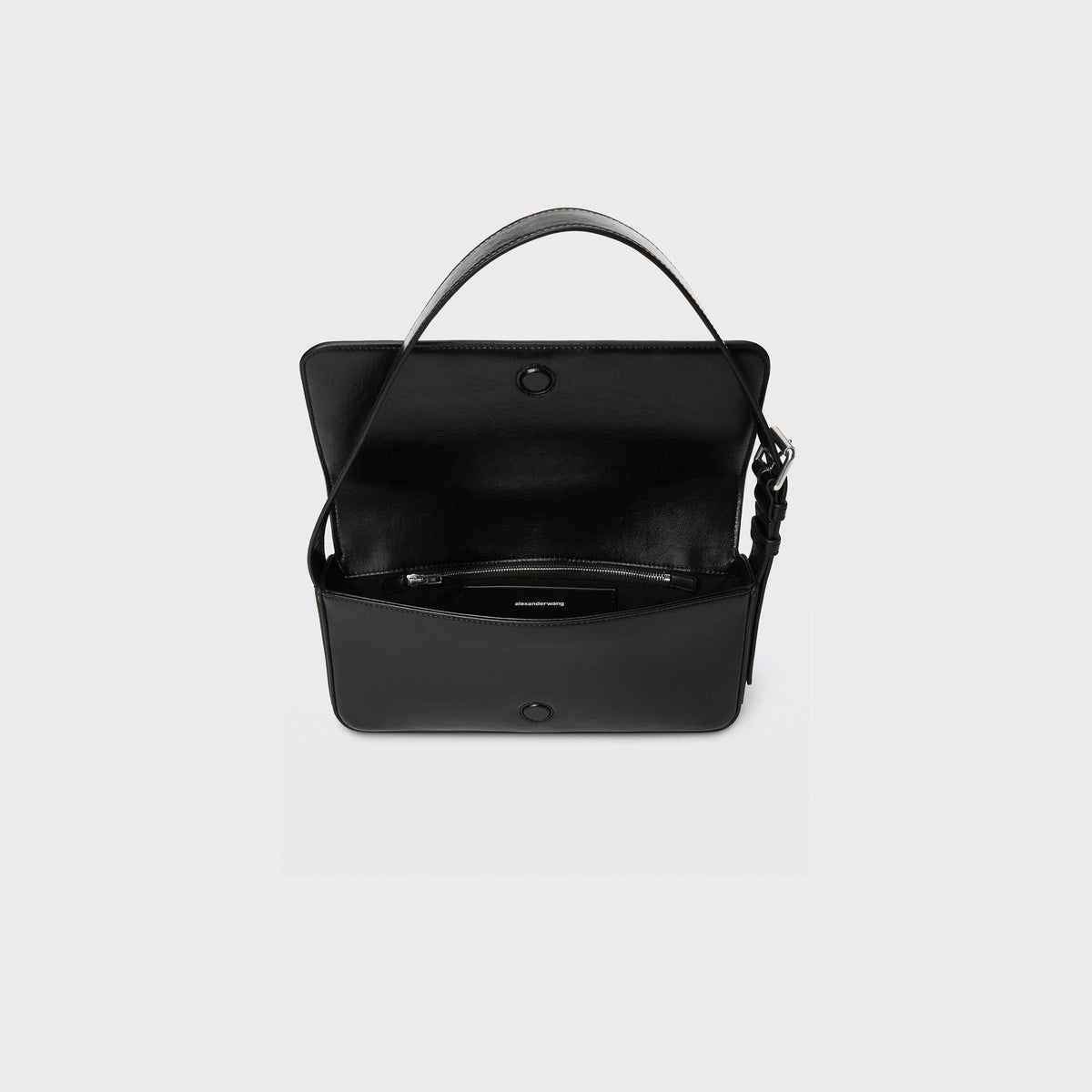 Alexander Wang Punch Flap Shoulder Bag in Black, shown with top handle and shoulder strap, front angled view