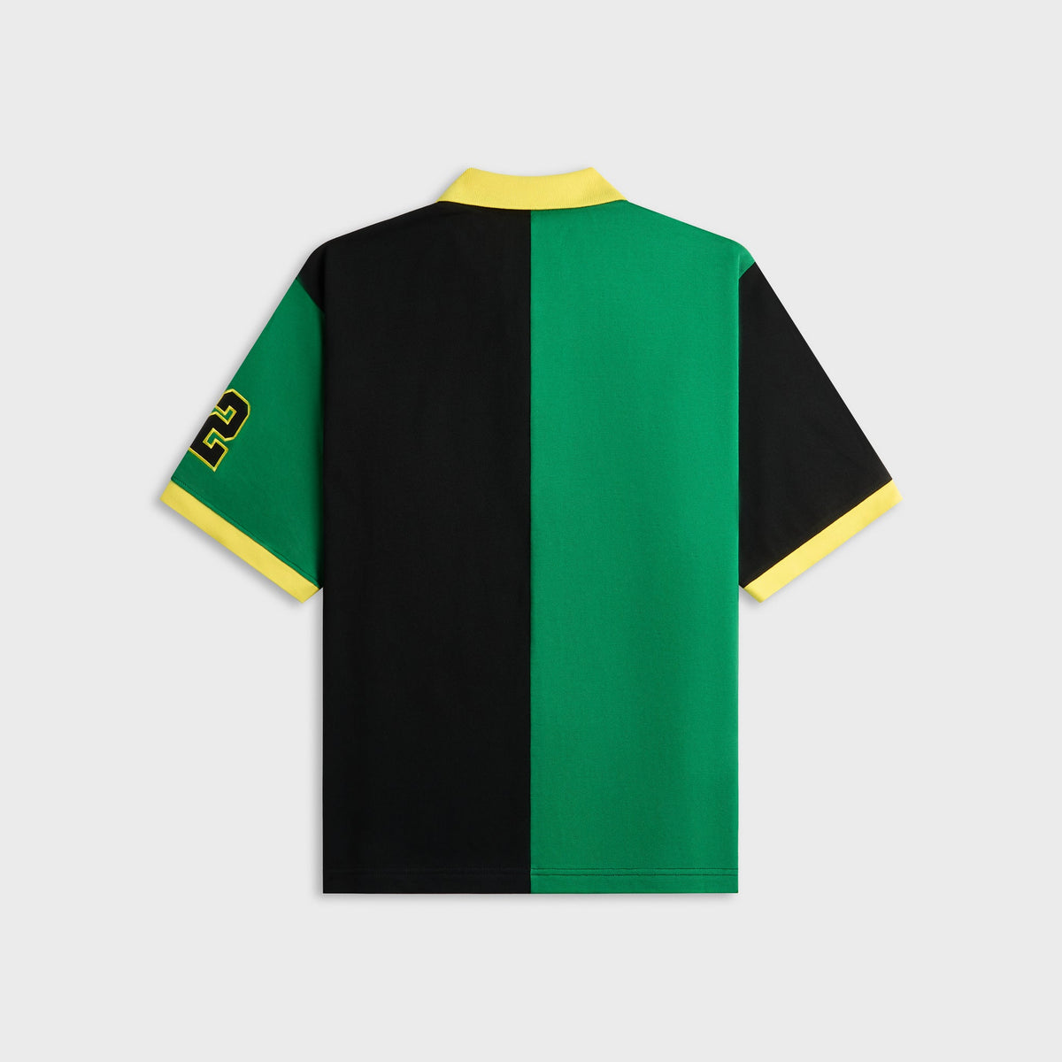 Awake NY Crown Polo in Green, color-block green and black polo, back view