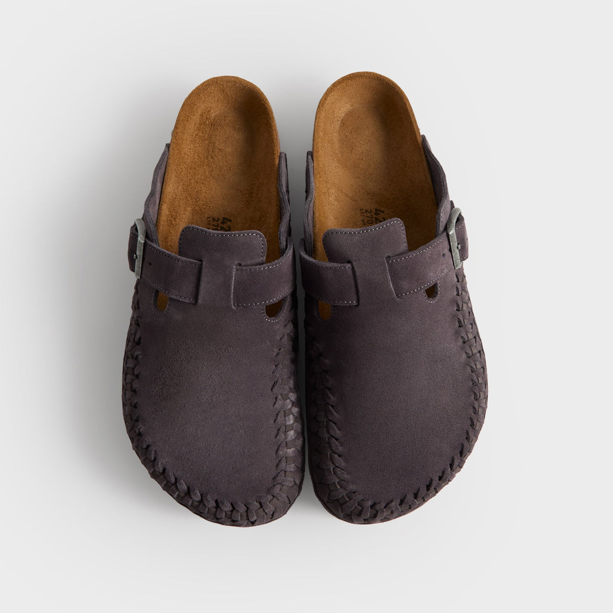 Kith for Birkenstock Boston Braided in Rabbit Grey, top-down view of the charcoal pair showing suede uppers, buckles and cork footbeds