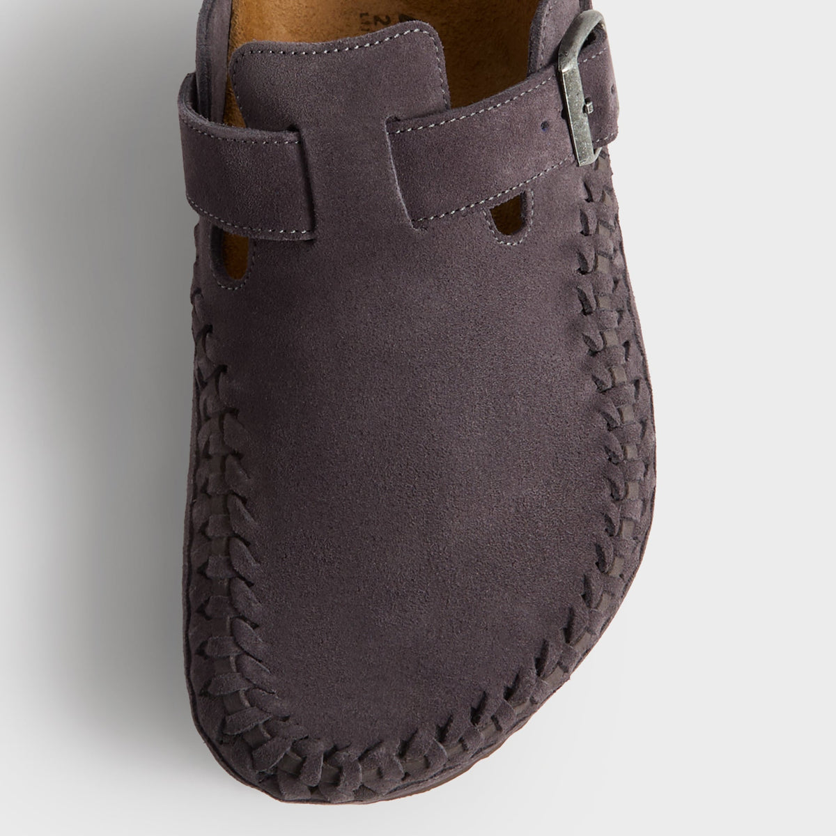 Kith for Birkenstock Boston Braided in Rabbit Grey, overhead close-up of the braided toe edge and charcoal suede strap