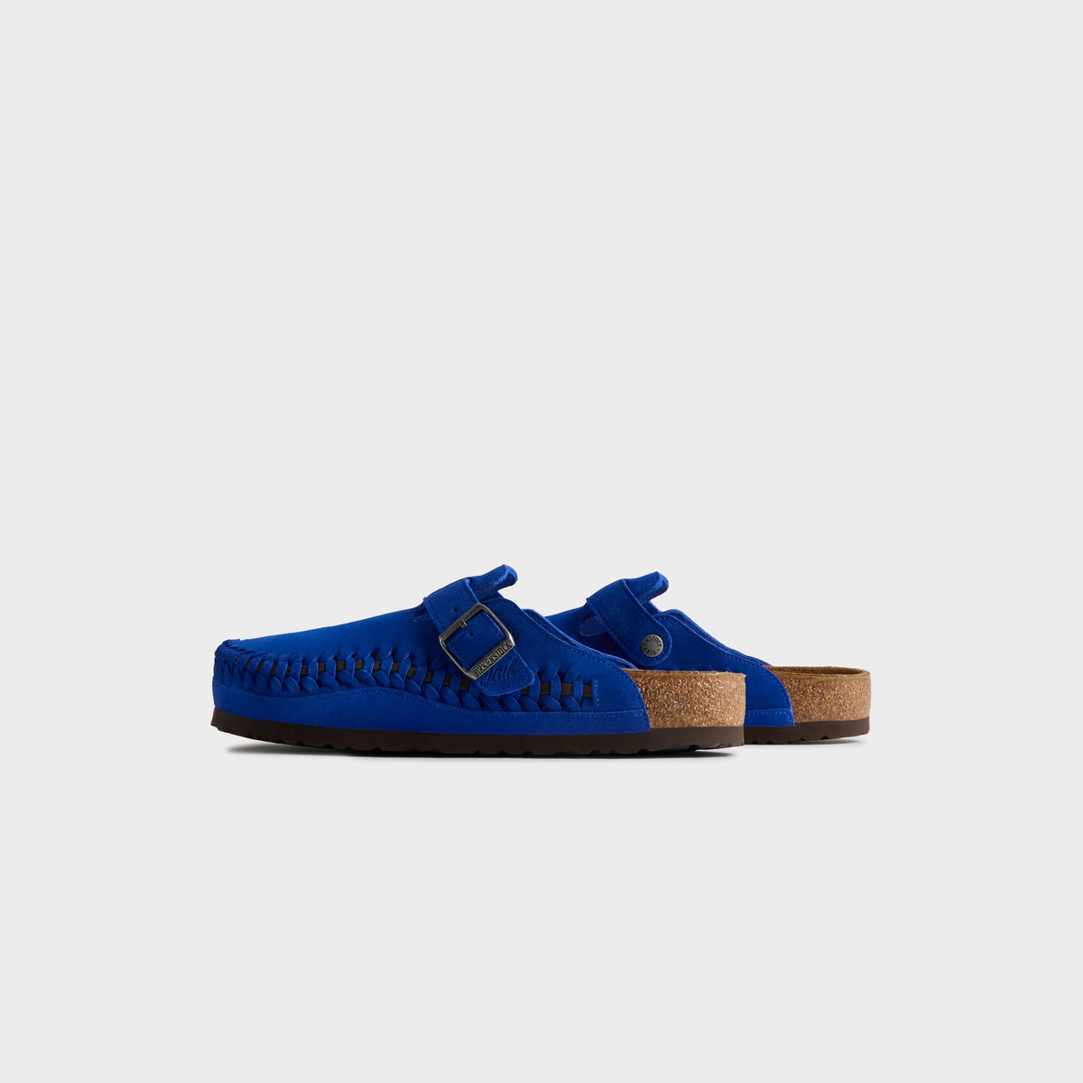Kith for Birkenstock Women's Boston Braided in Ultra Blue, rear three-quarter view of the open-back cobalt suede clog pair