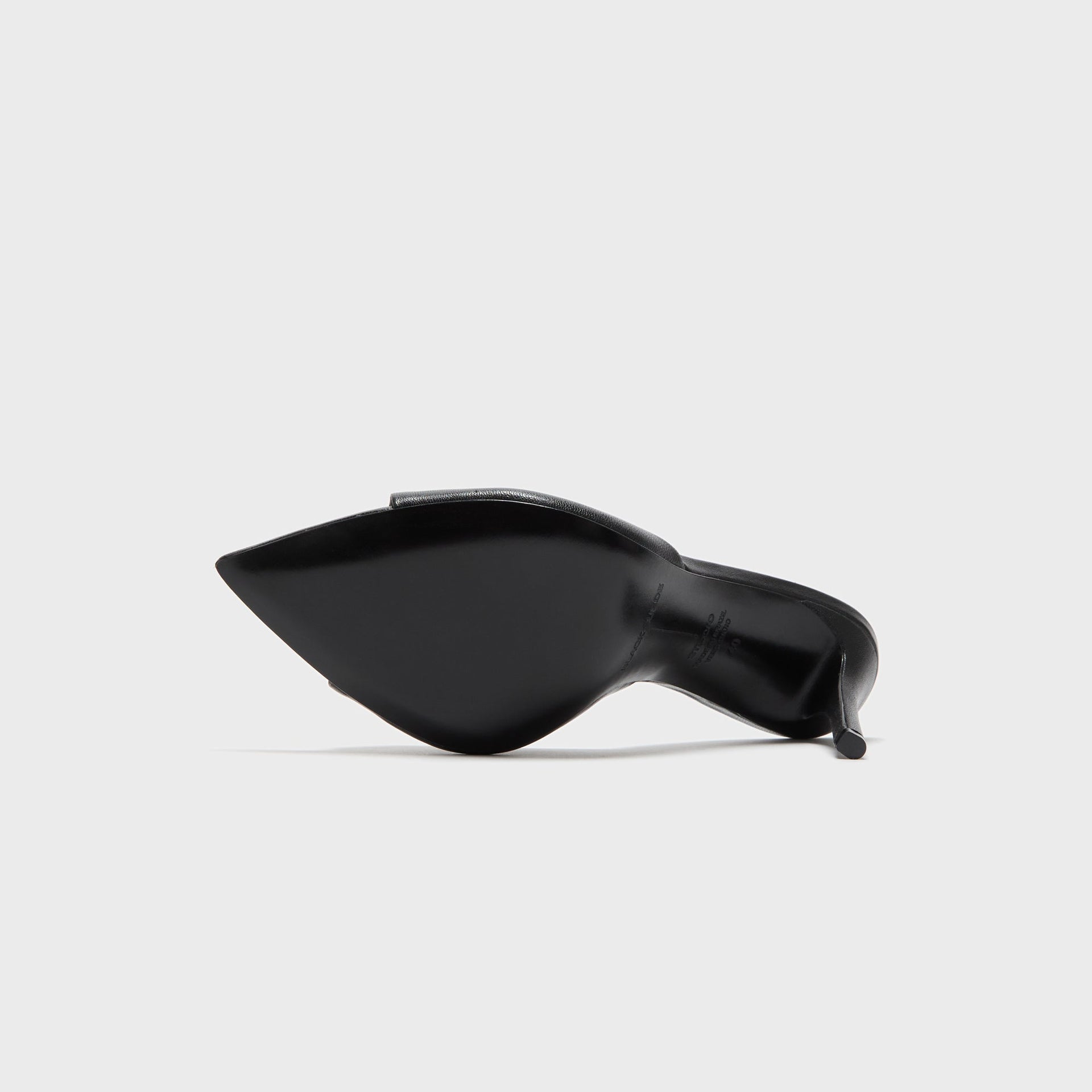 Black Suede Studio Brea heeled mule in black leather, bottom view of the pointed black sole