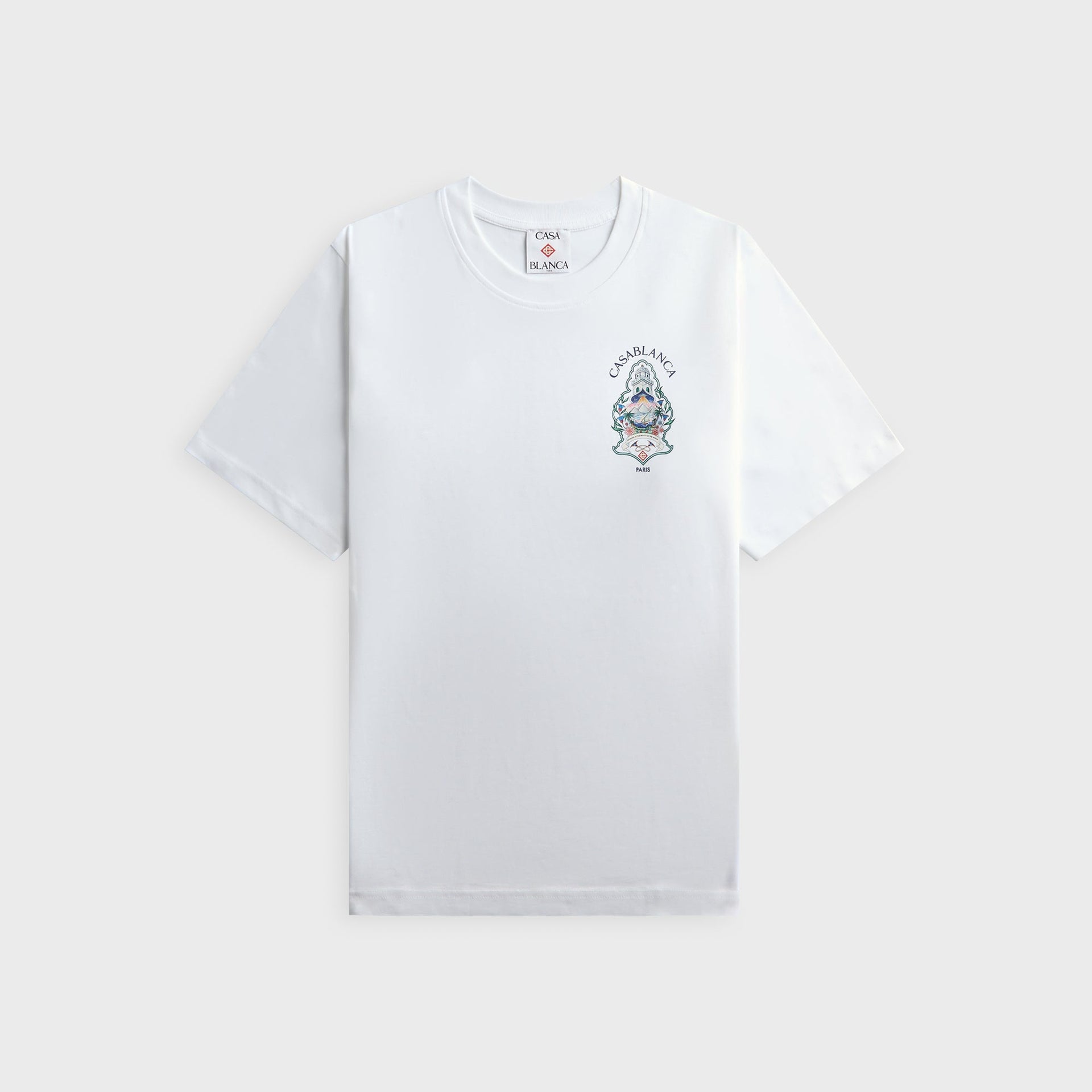 Casablanca Hotel Emblem white tee, front view with small left-chest lighthouse island emblem