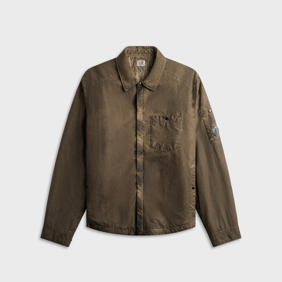 C.P. Company Flatt Nylon Lens Padded Zipped Overshirt in Re-Color Brown, distressed brown overshirt with lens detail, front view