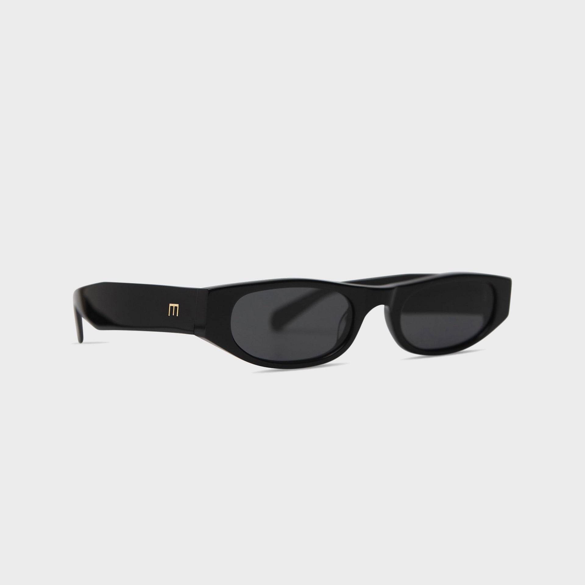Elisa Johnson Yves gloss black oval sunglasses, three-quarter angled view