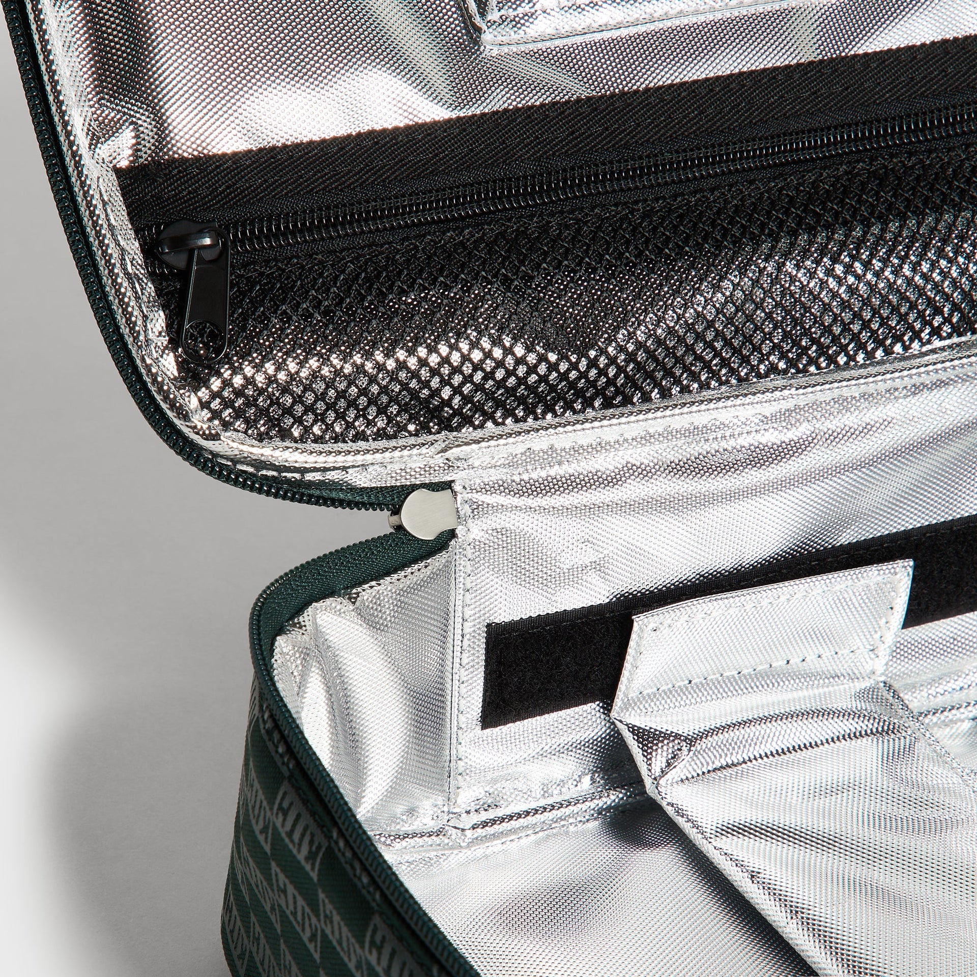 Kith Kids for STATE Rodgers Lunch Box open view showing silver insulated lining and mesh lid pocket