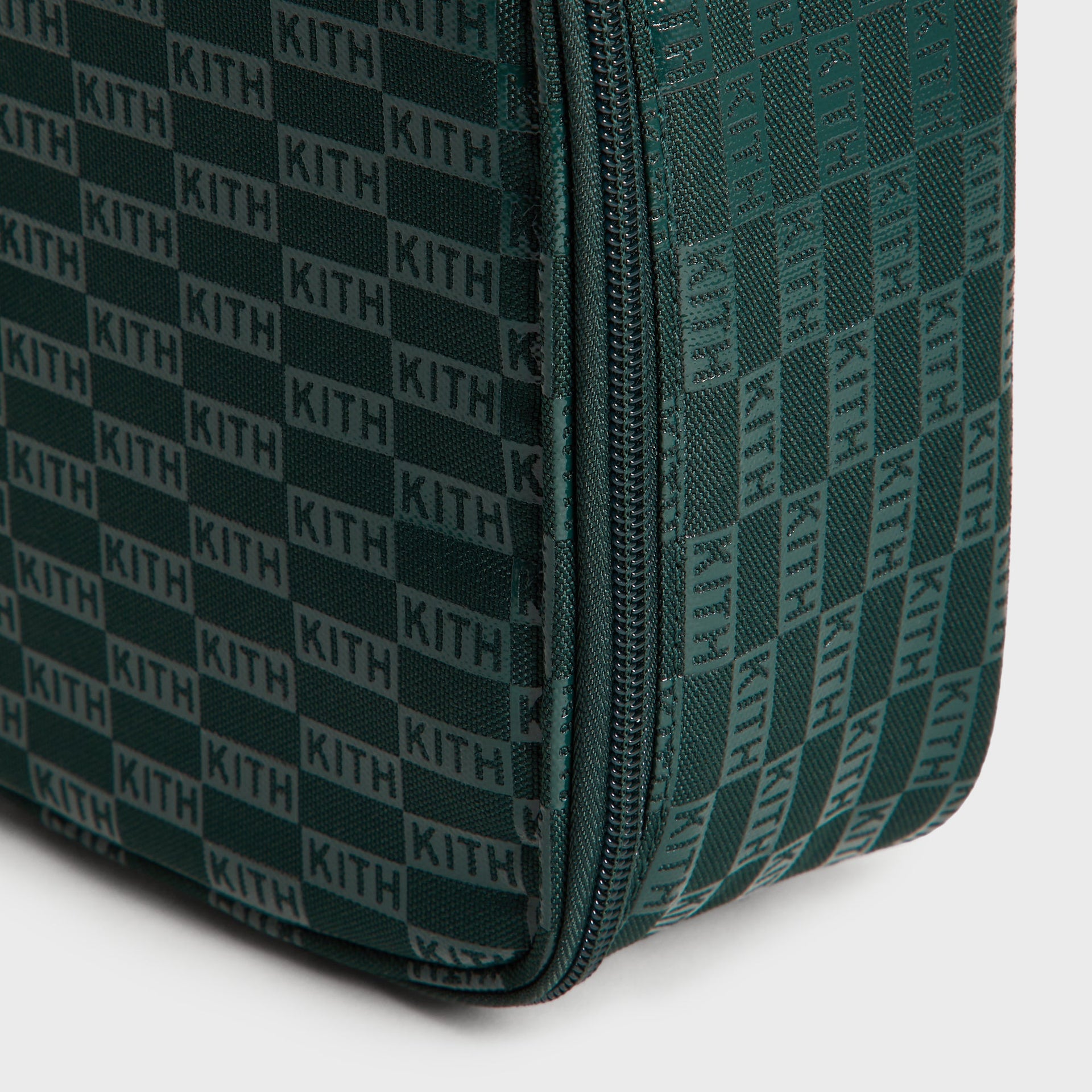 Kith Kids for STATE Rodgers Lunch Box close-up of green KITH monogram exterior corner and zipper