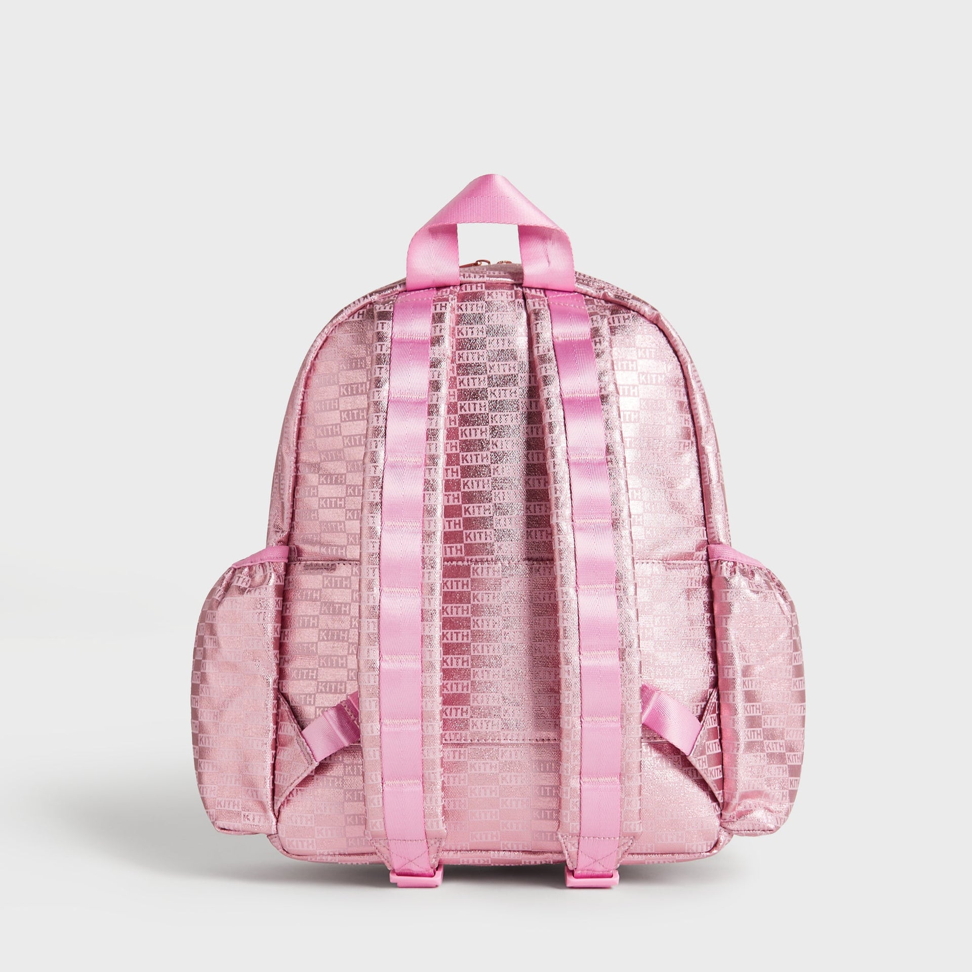 Kith Kids for STATE Kane Backpack in metallic pink, back view with padded shoulder straps