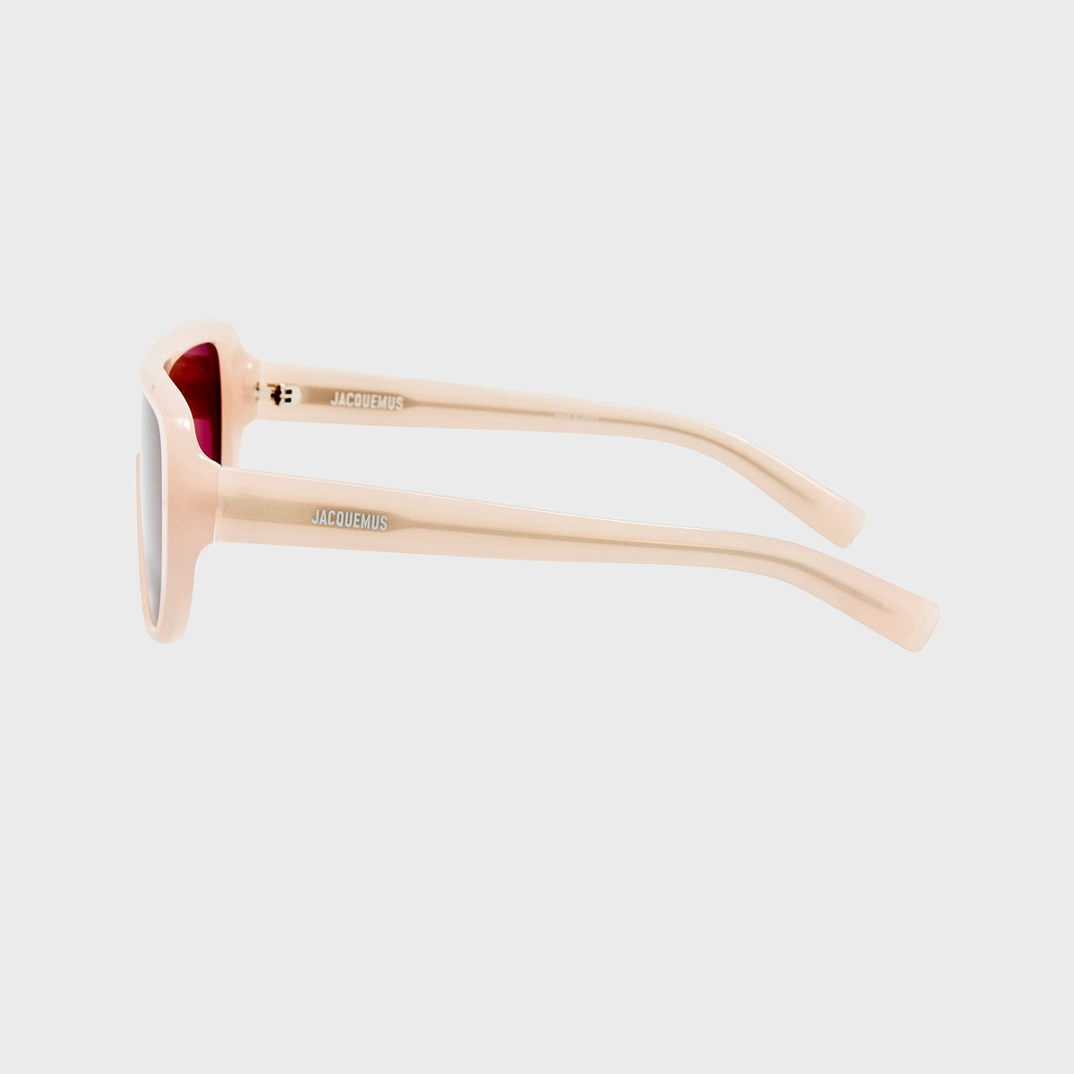 Jacquemus JAC156C2SUN aviator sunglasses in white, close-up side view of the hinge and red temple tip