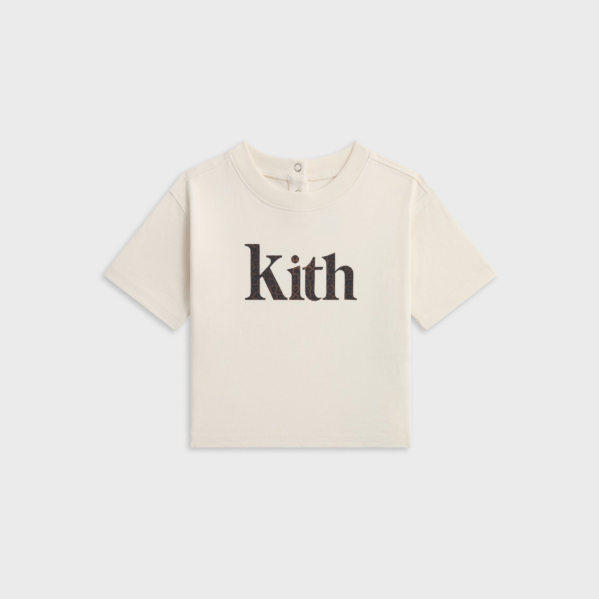Kith Baby Leopard Kith Serif Leonard Tee in Sandrift, flat lay front view with leopard-print Kith wordmark