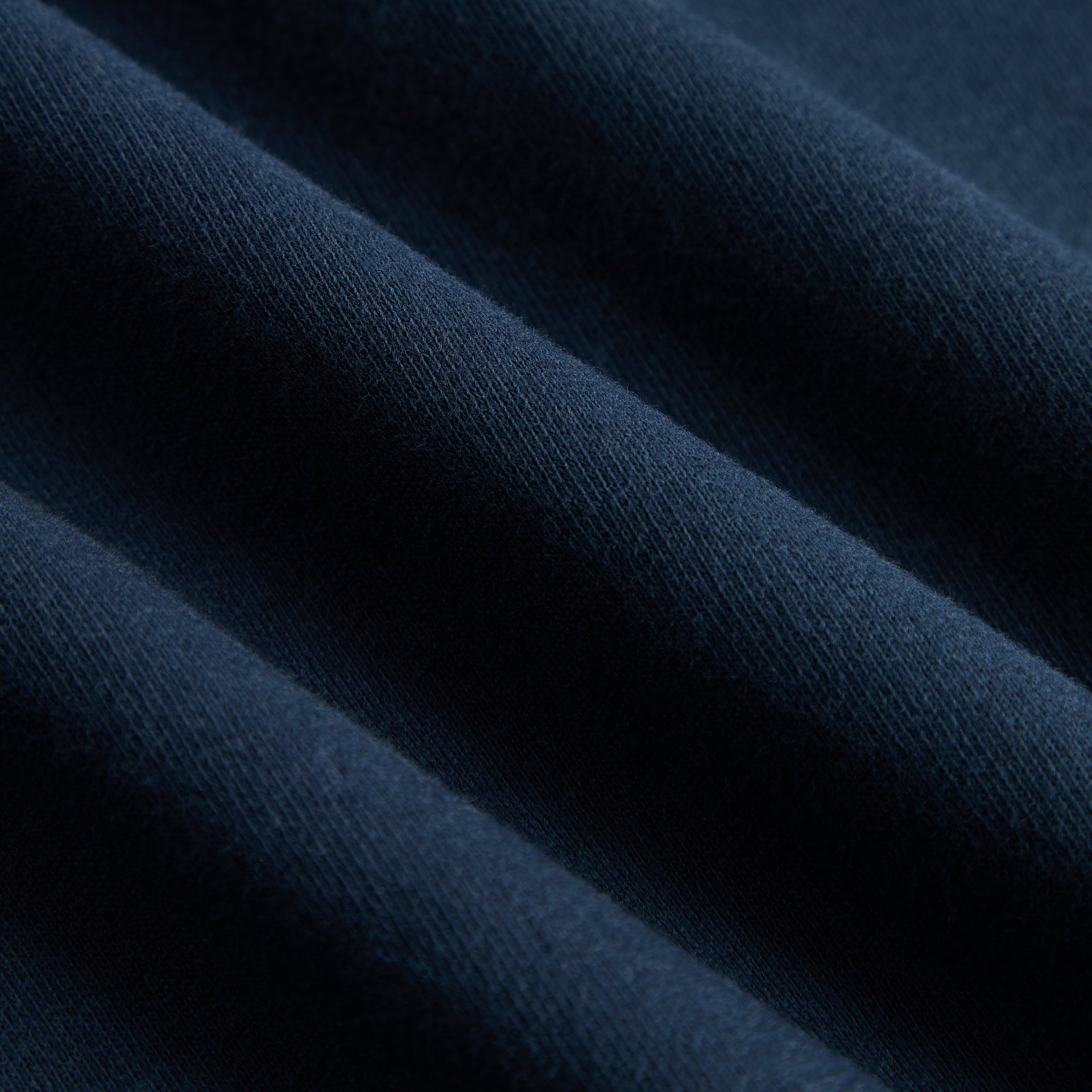 Kith Baby Williams II Pant, close-up of soft navy fleece fabric texture