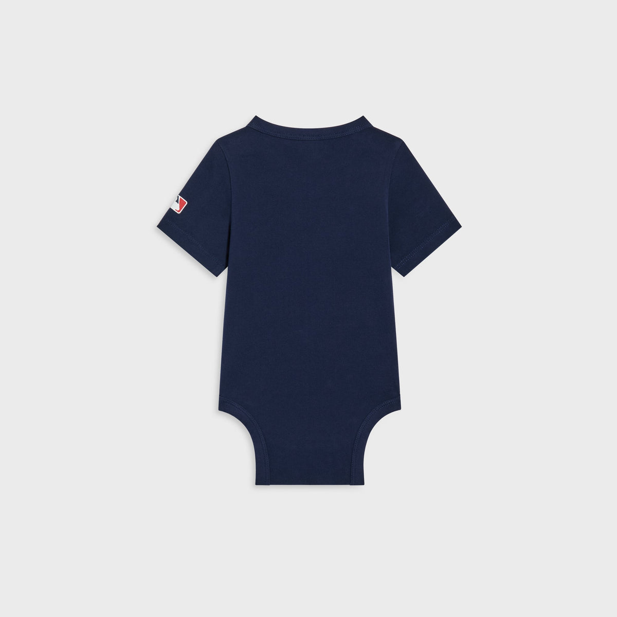 Kith Baby for the New York Yankees Legacy Bodysuit in Nocturnal navy, flat lay back view